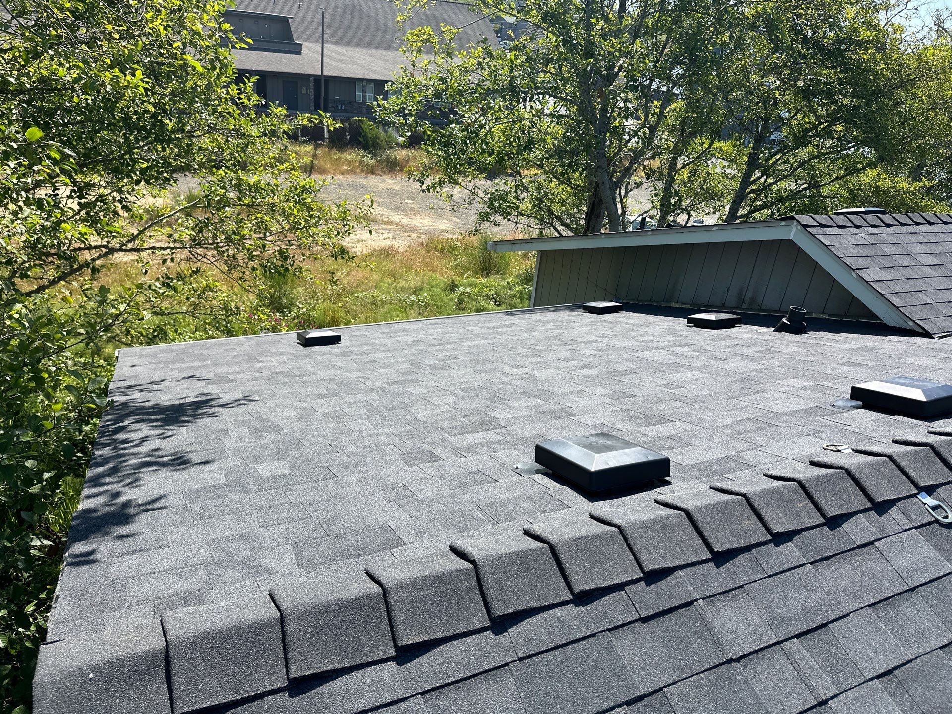 Residential Roofing Installation using Malarkey Highlander (Color: Midnight Black) by Orezona Building & Roofing Company, Inc.