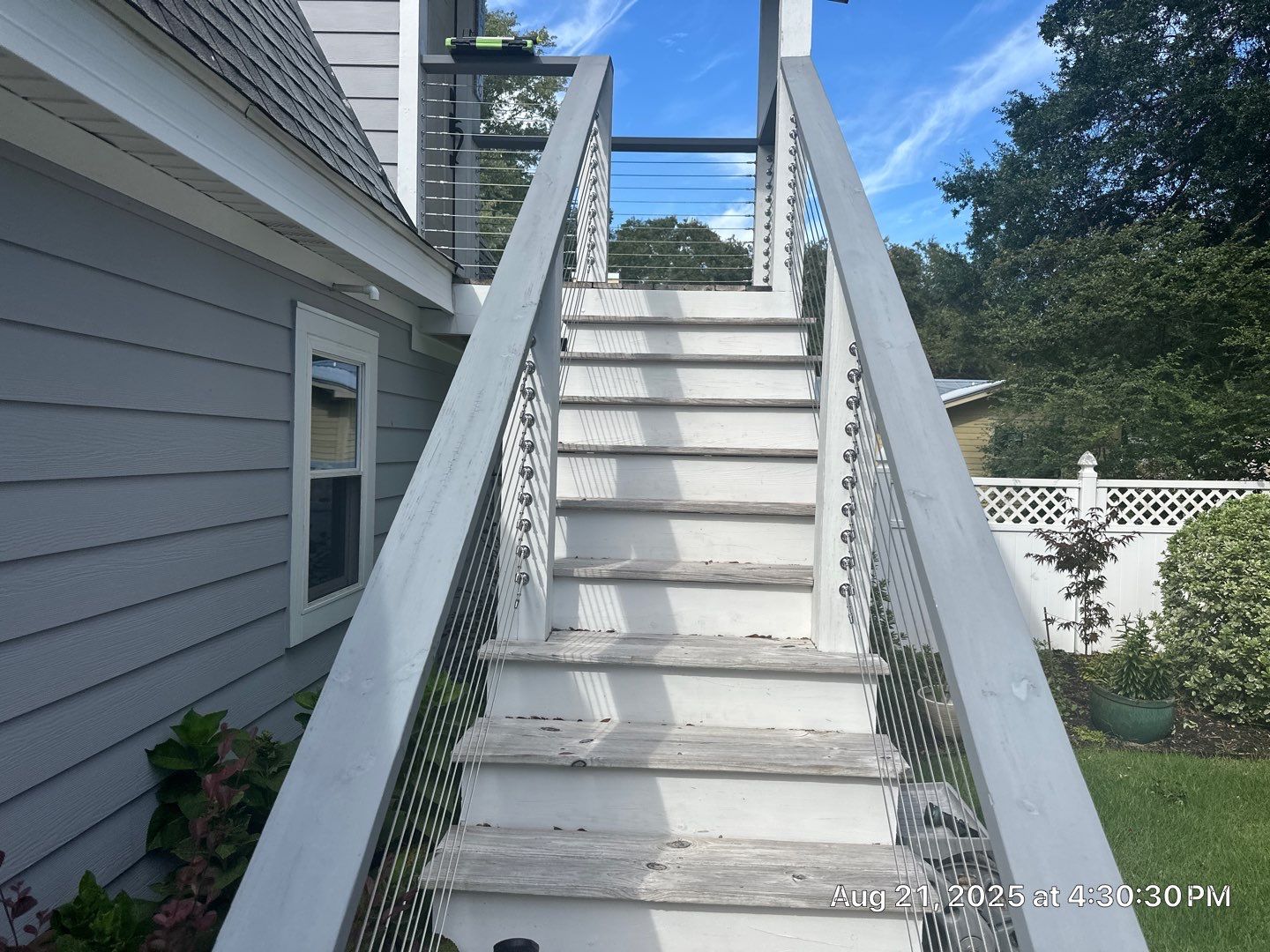 Wood Deck and Concrete Driveway using Wood and Concrete Sealant by DuraSeal
