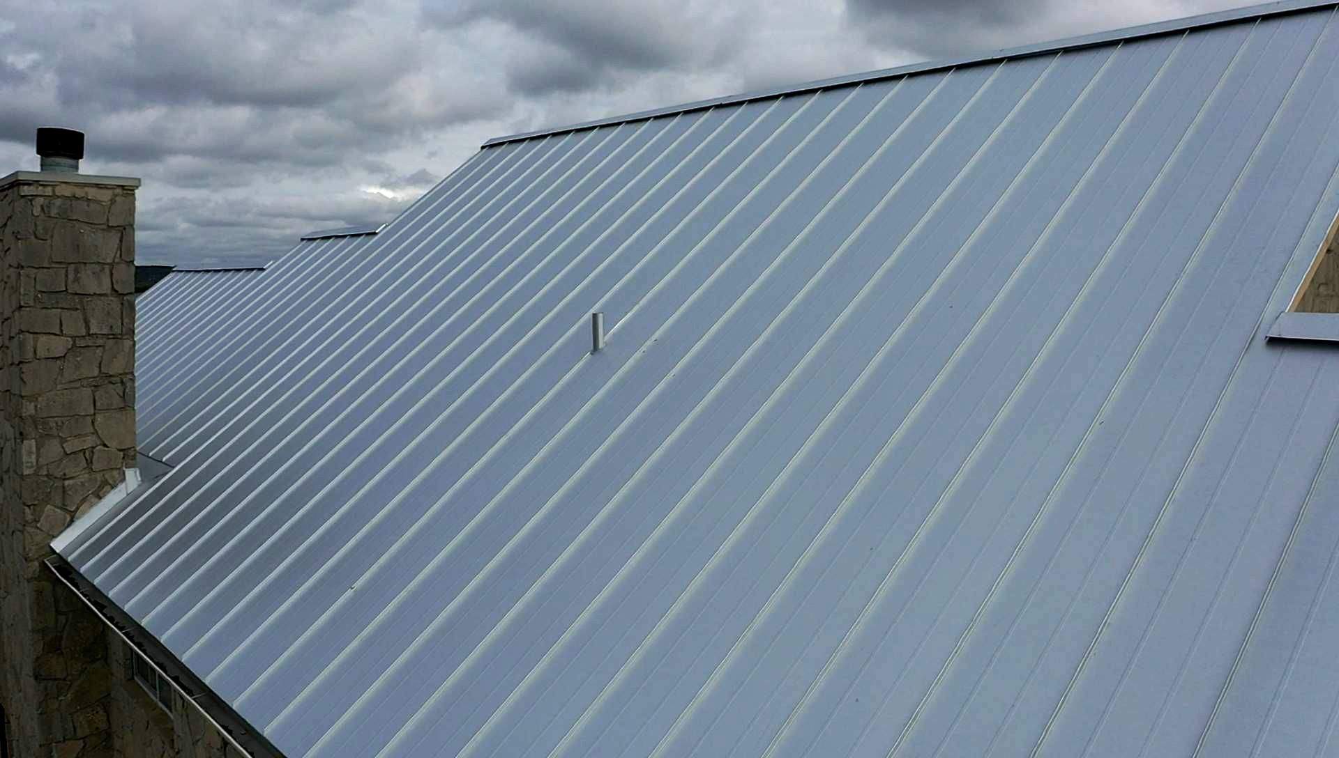 Residential Metal Roof Installation using McElroy Metal by Premier Roofing and Contracting