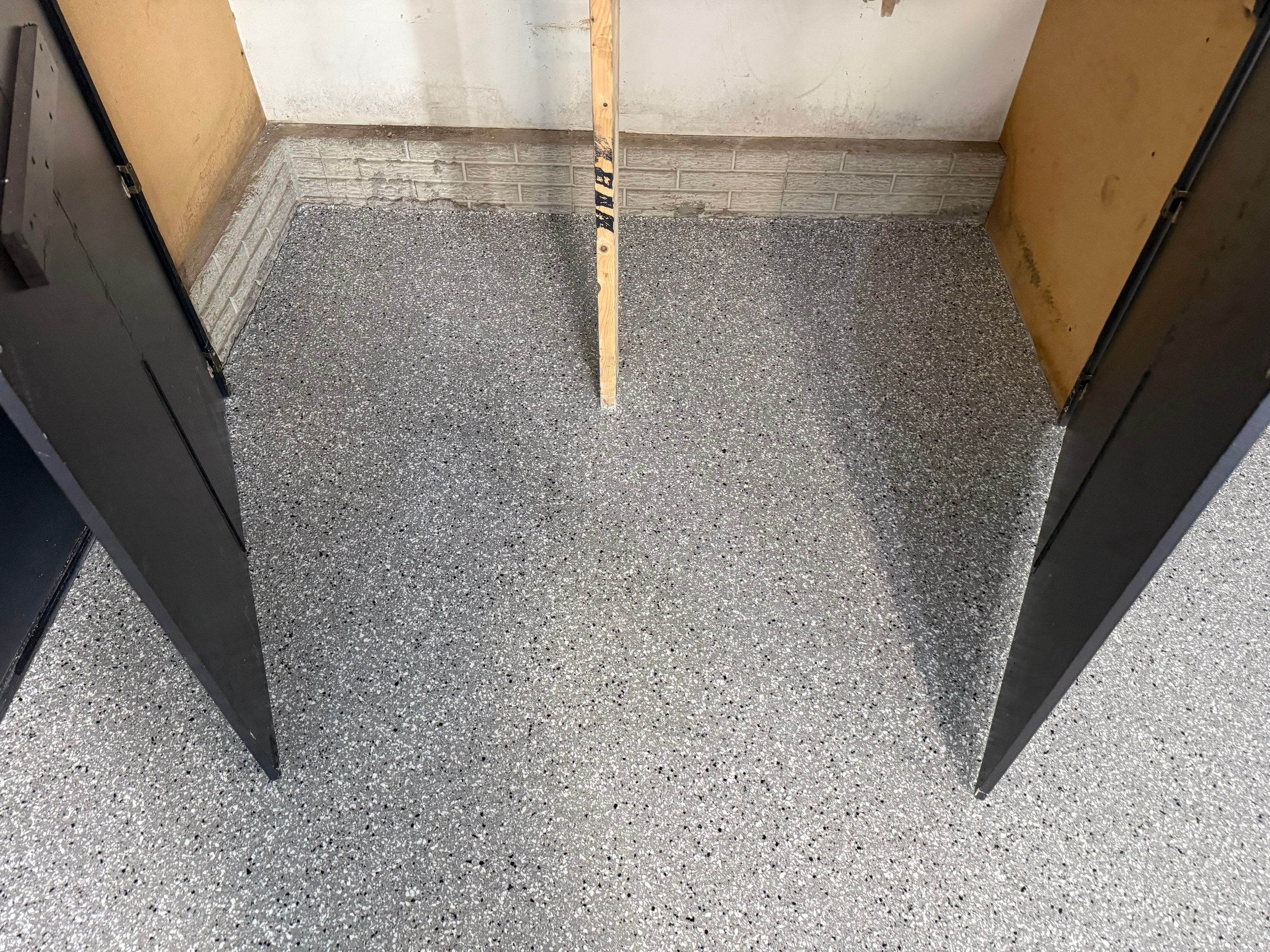 Garage Floor and Textured Pool Deck Coating in Sioux Falls by Select Painting, Coatings & Garage Cabinets