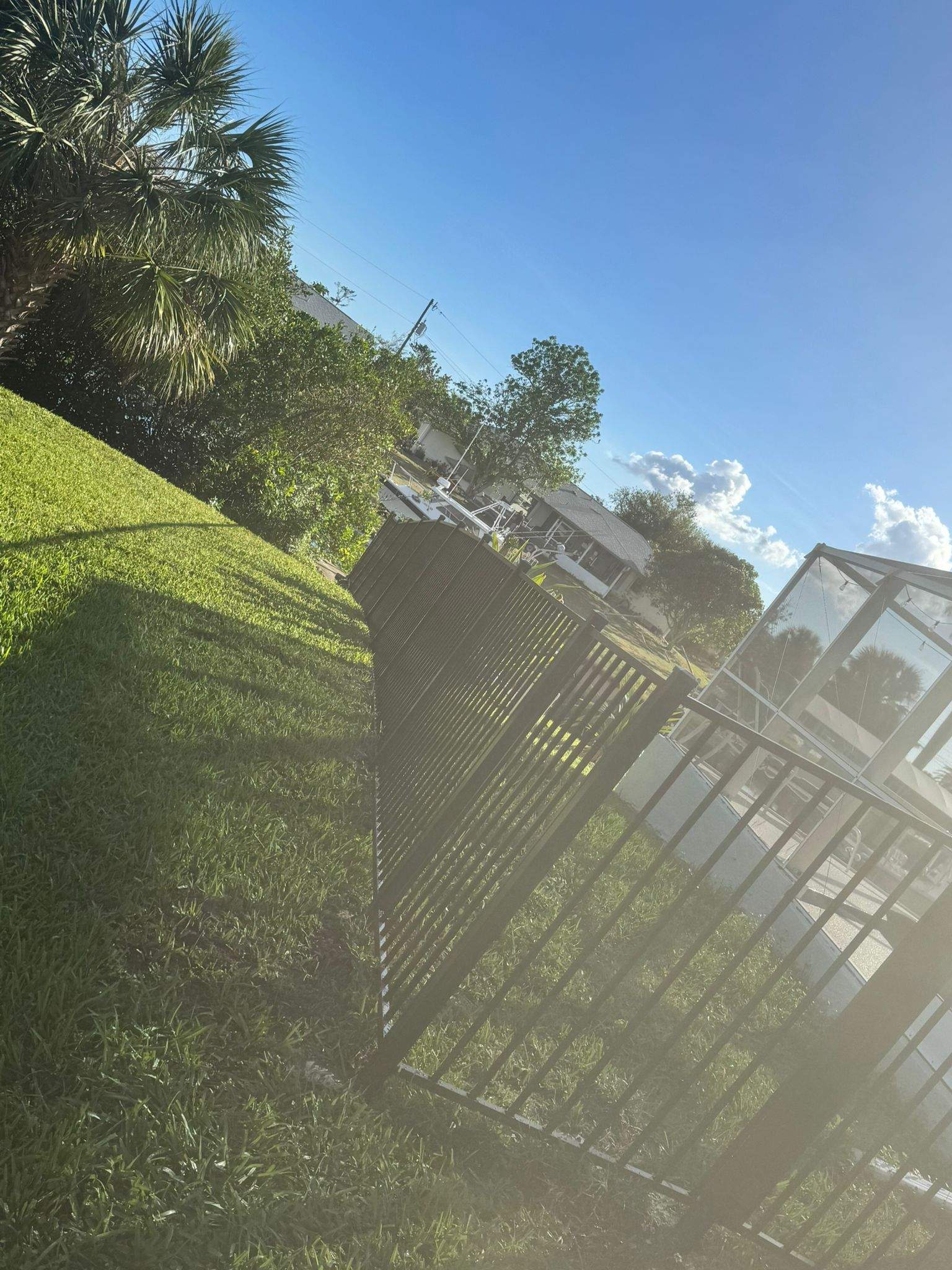 Bronze Aluminum Picket Fence Installation in Port Charlotte by True Fence LLC