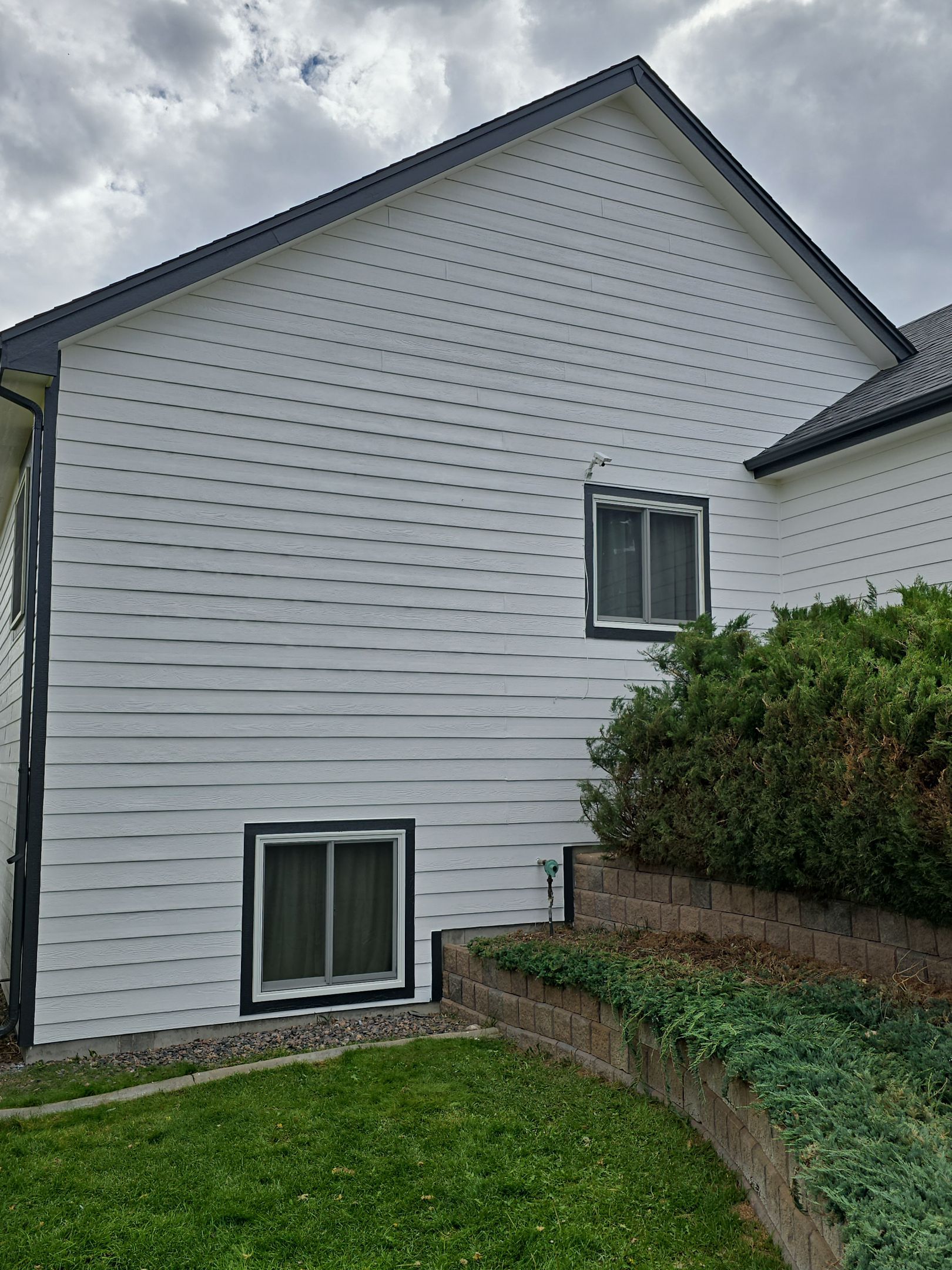 From Faded to Timeless: White & Black Exterior Renewal by J&M Painting LLC