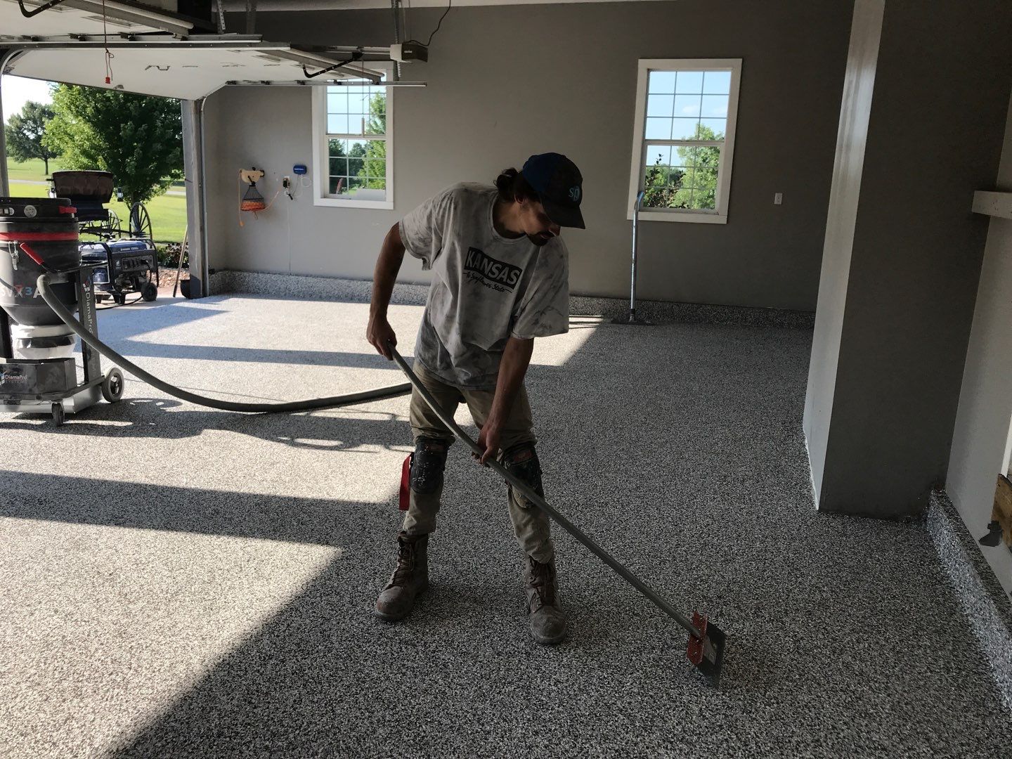 Garage using Domino  by Select Painting, Coatings & Garage Cabinets