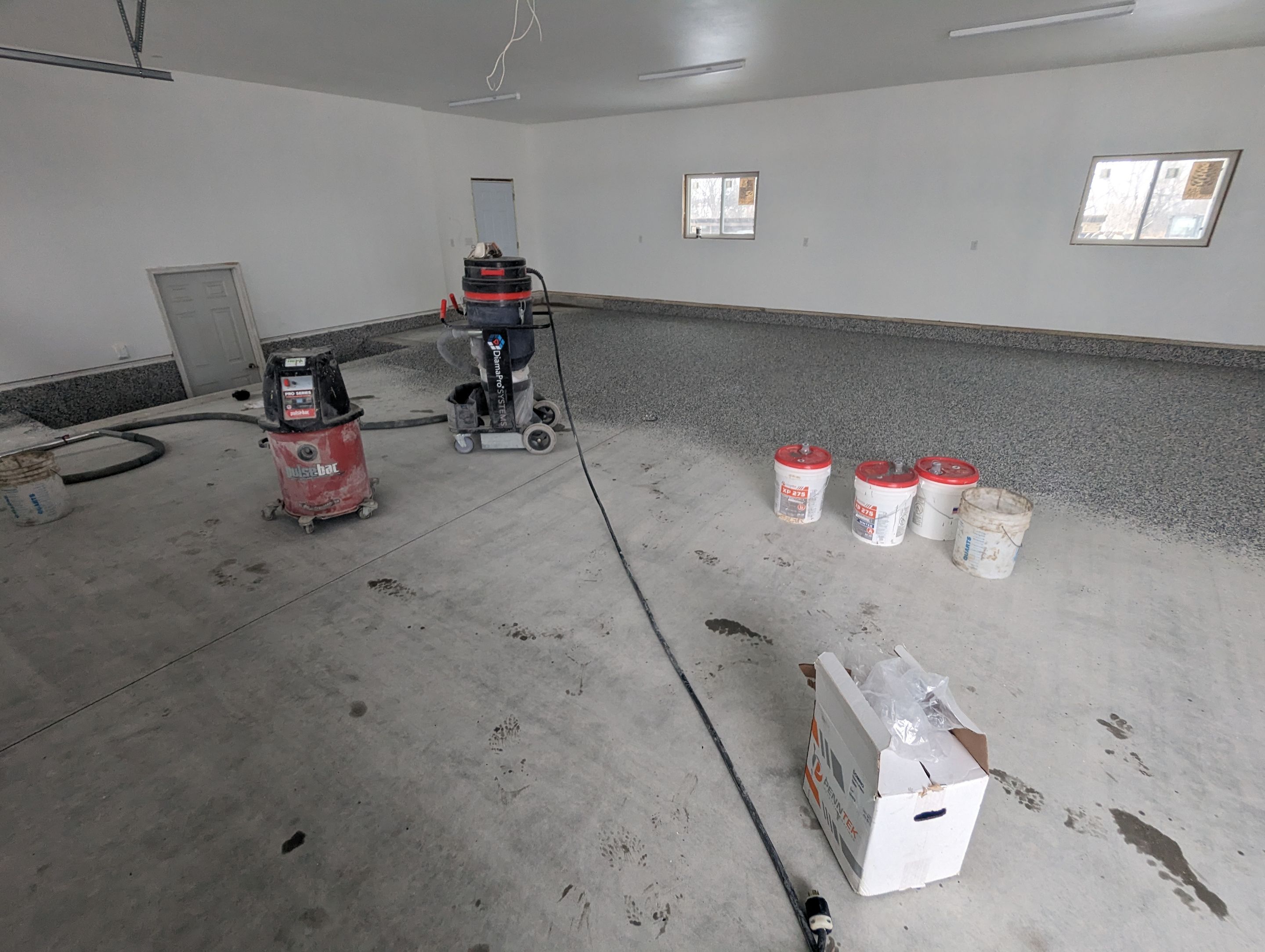 Garage using Domino  by Select Painting, Coatings & Garage Cabinets