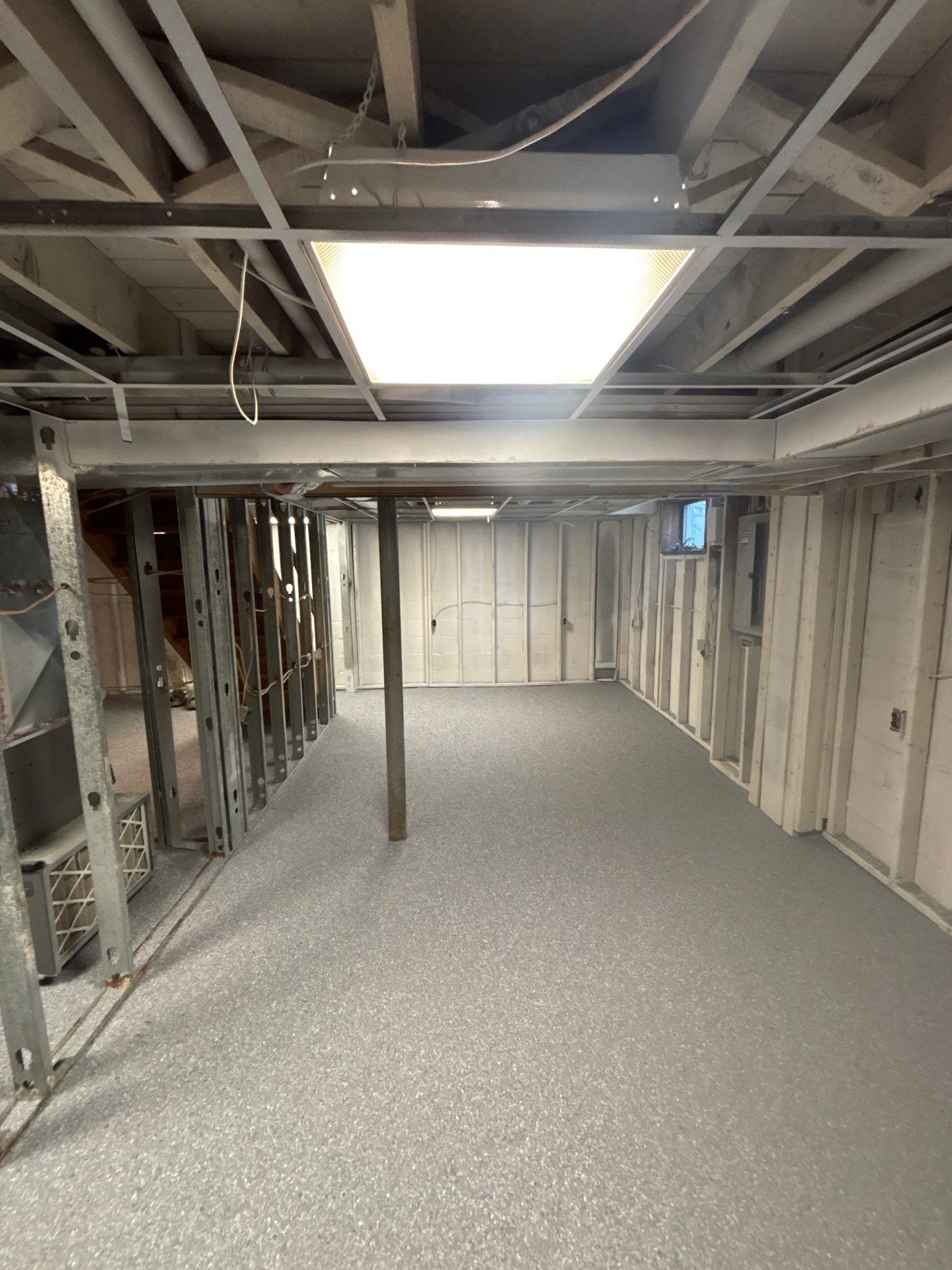 Basement Concrete Floor Coating with Penntek Flake System by Spectrum Painting, LLC