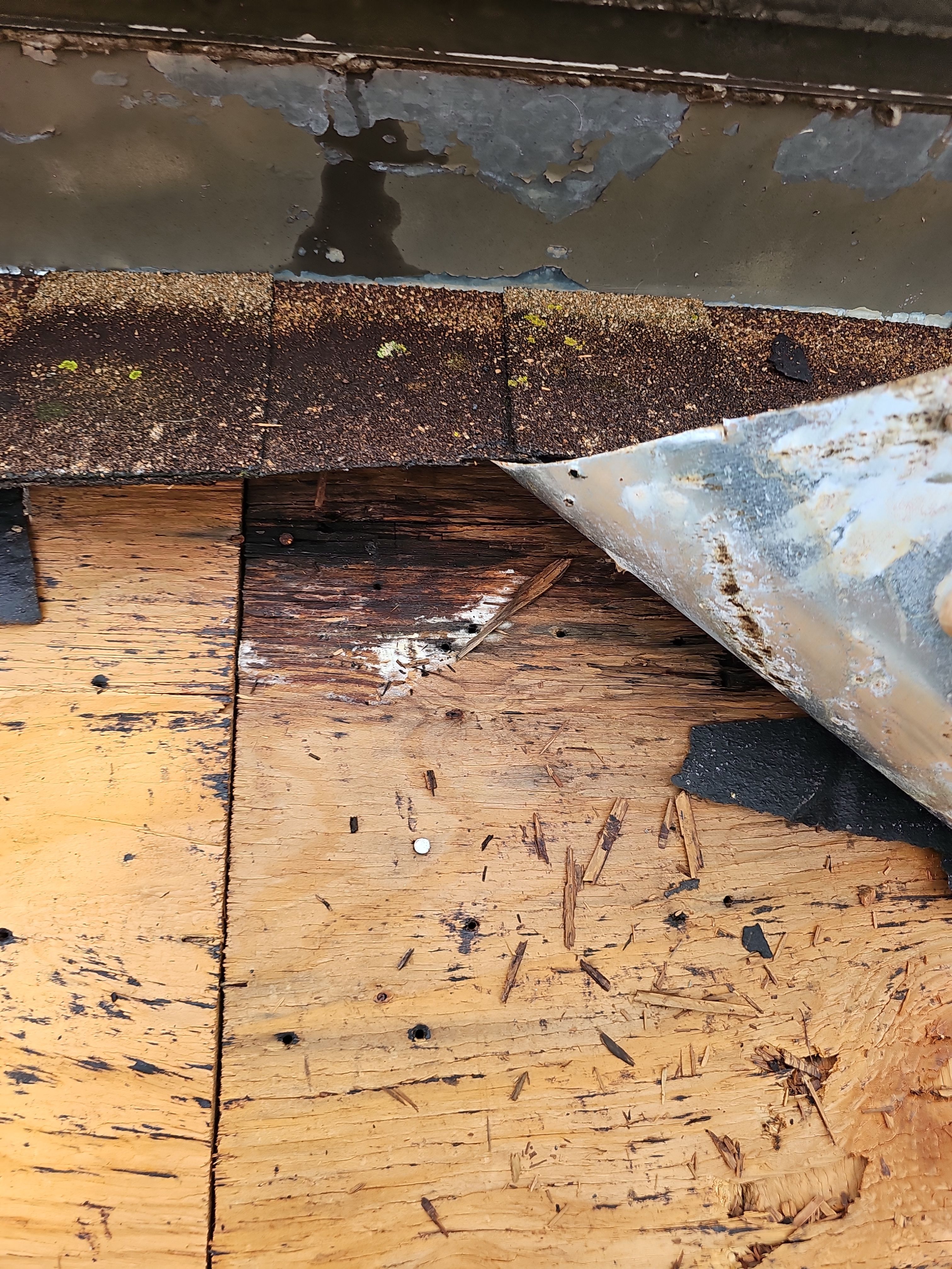 "Full Roof Replacement Due to Hail and Water Damage – Before & After" by road roofing llc
