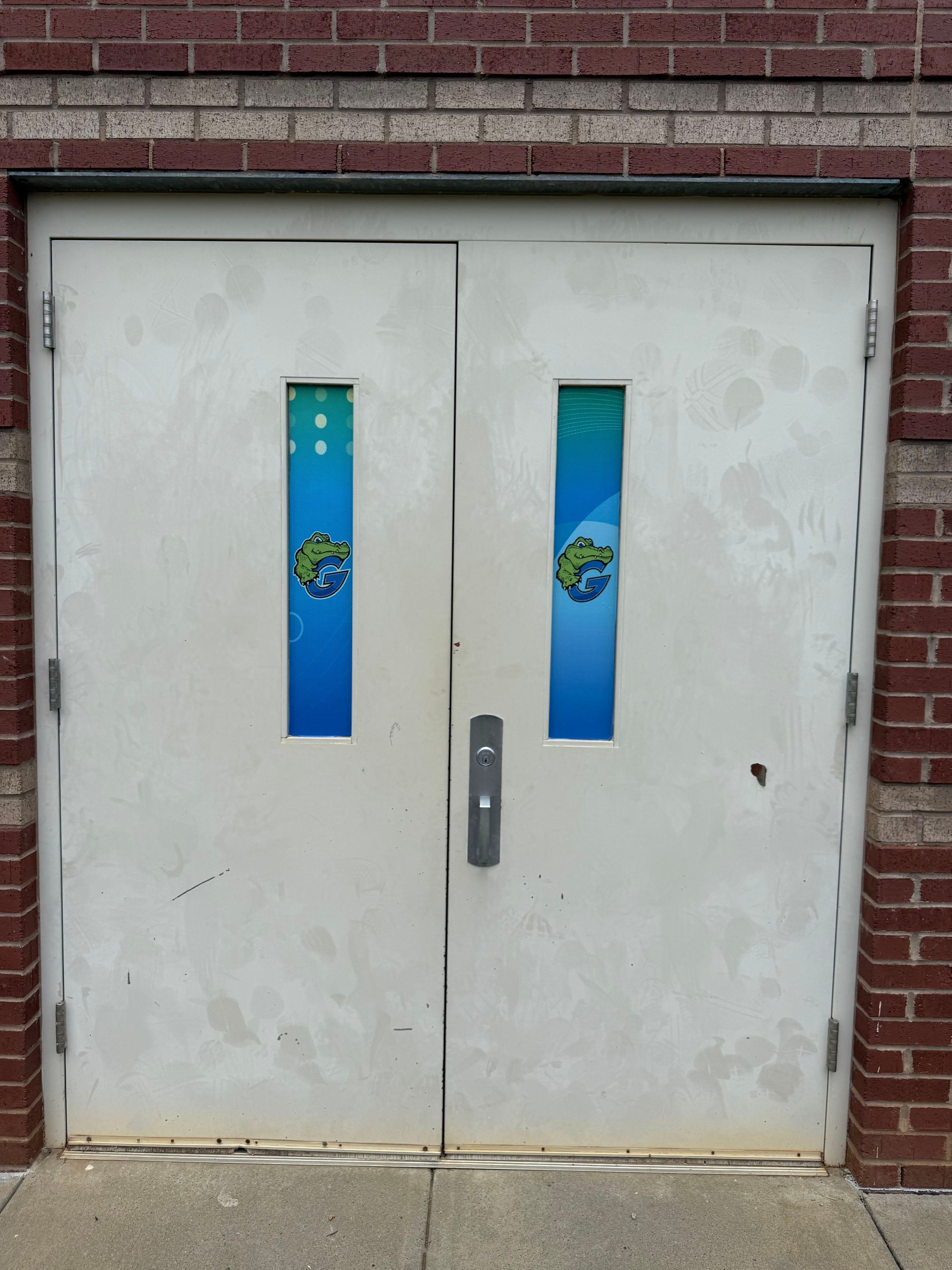 Rivergate Elementary - Window Safety Film Installation with Custom Graphics by QC Signs and Graphics