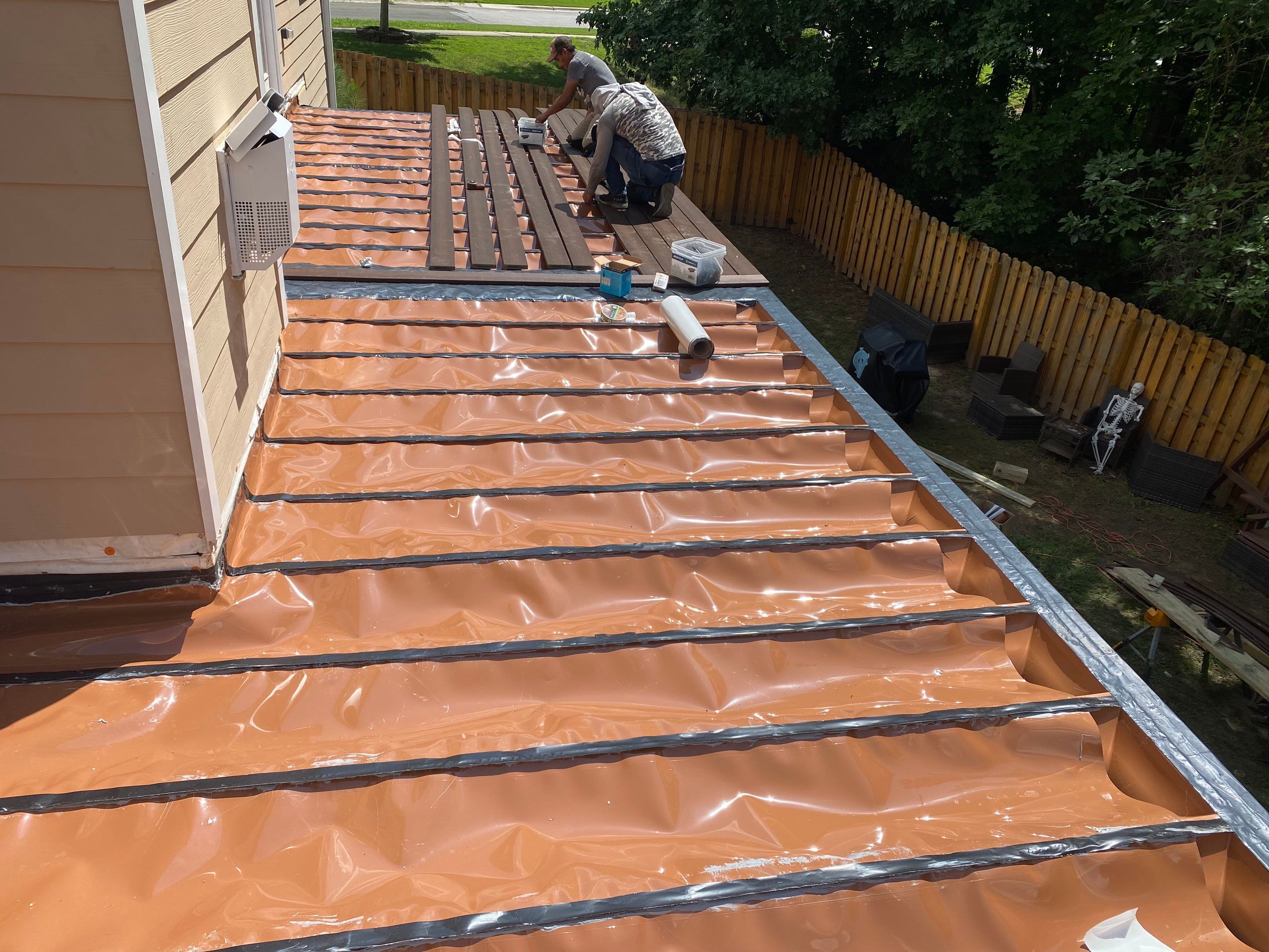 Trex Decking, Aluminum Railing, Rain Escape Underdecking by The Remodeling Company
