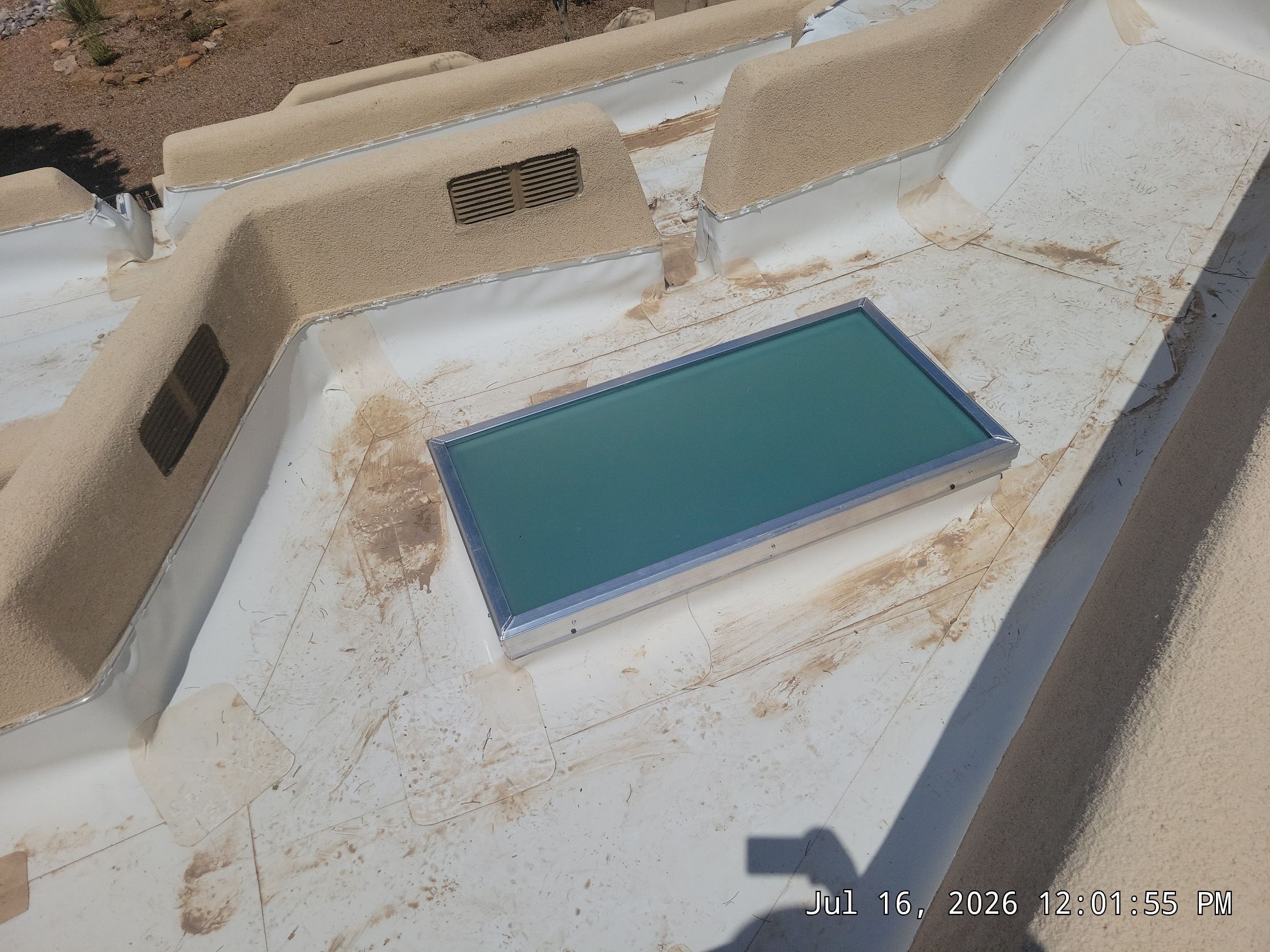 Low-e Glass Skylight Installation in Rio Rancho by Doyle Roof Masters Inc