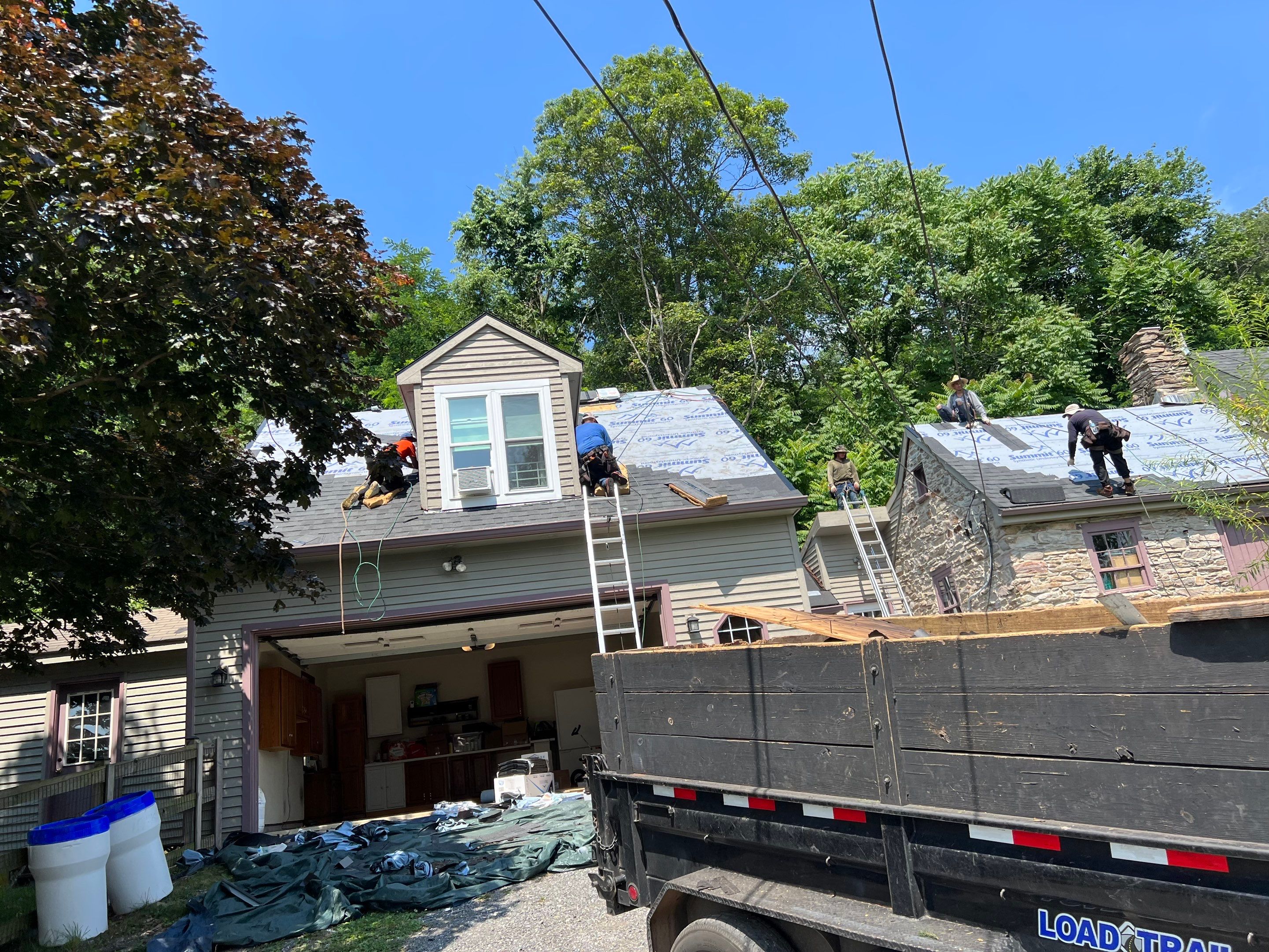 Residential Roofing Installation using Atlas Pinnacle Pristine Black Architectural Shingles by Frederick Roof Repair