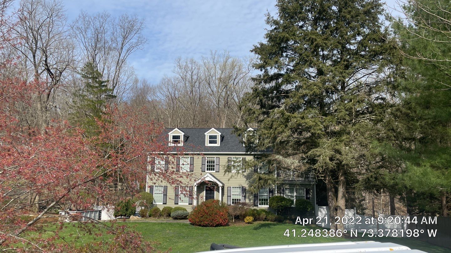 Residential Roofing Installation using onyx black by A Plus Exterior