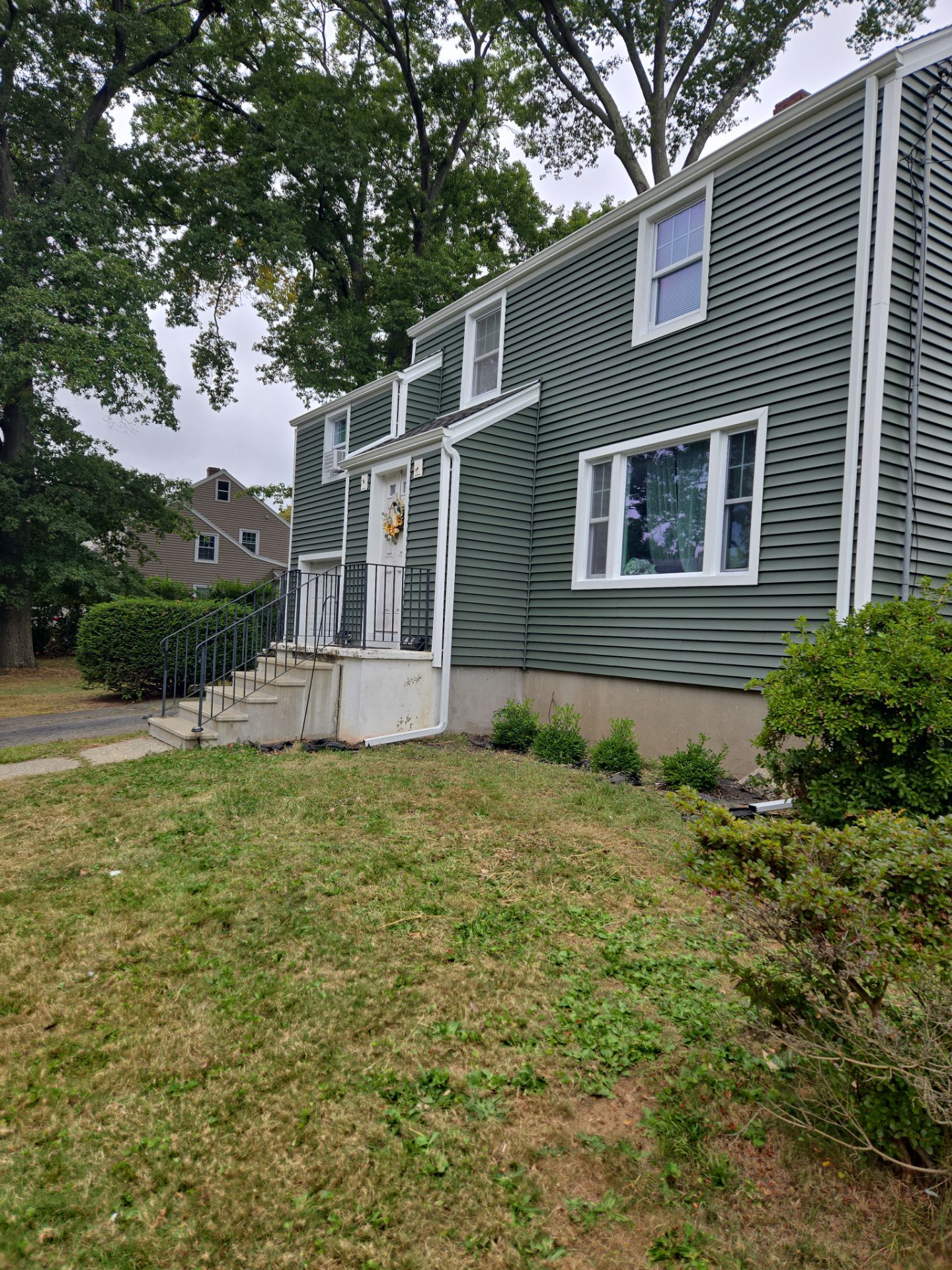Siding Installation using CertainTeed Monogram Vinyl Siding - D4 - Forest by A Plus Exterior