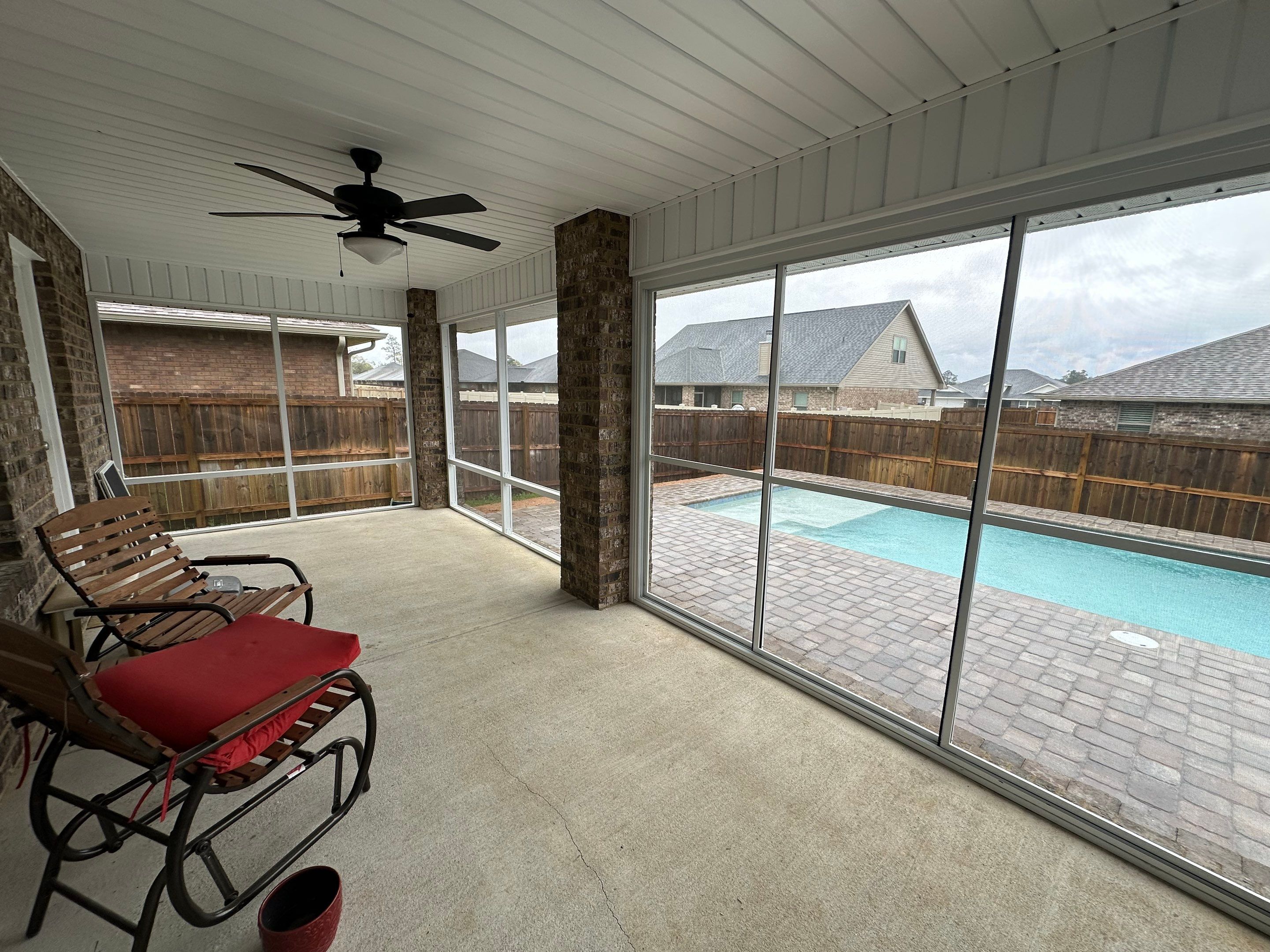 Poolside Screen Room Under Existing Patio Cover by Titan Sunrooms