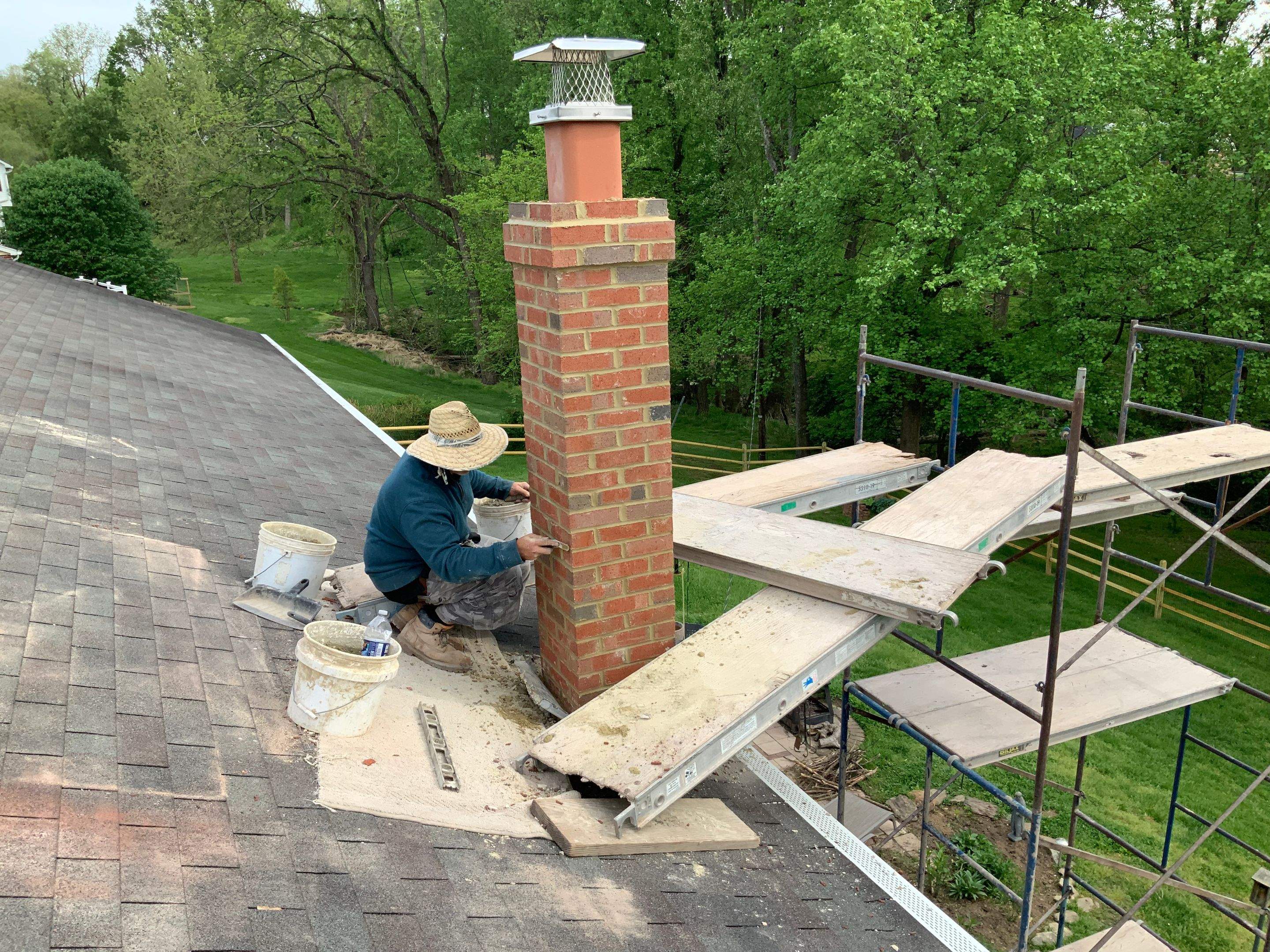 Residential Roofing Installation using Landmark Shingles Color Weatherwood by Alpha Design Services