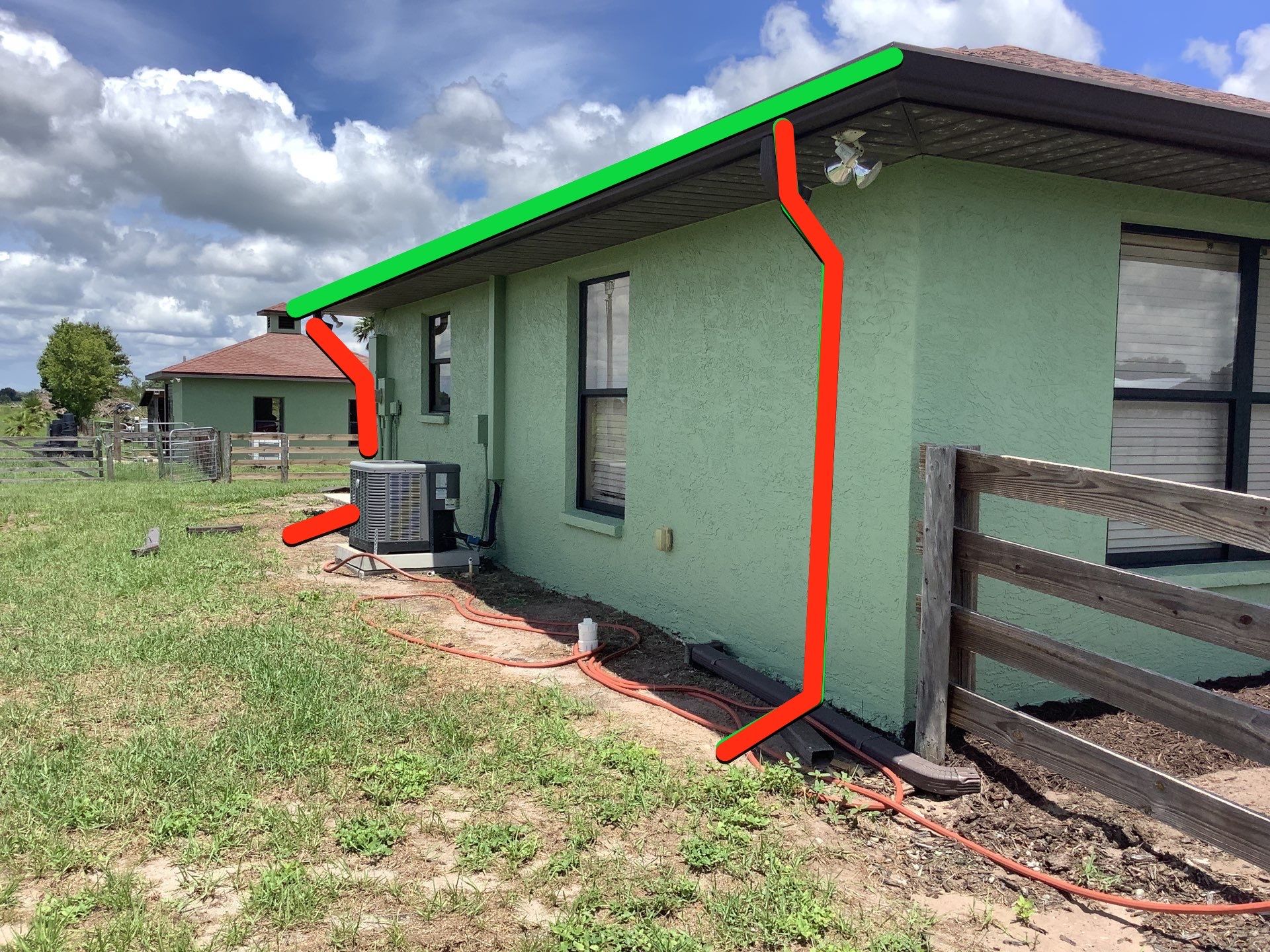 Musket brown downspouts with 6-inch K-Style gutter installation in Myakka City, FL by Gutter Professors