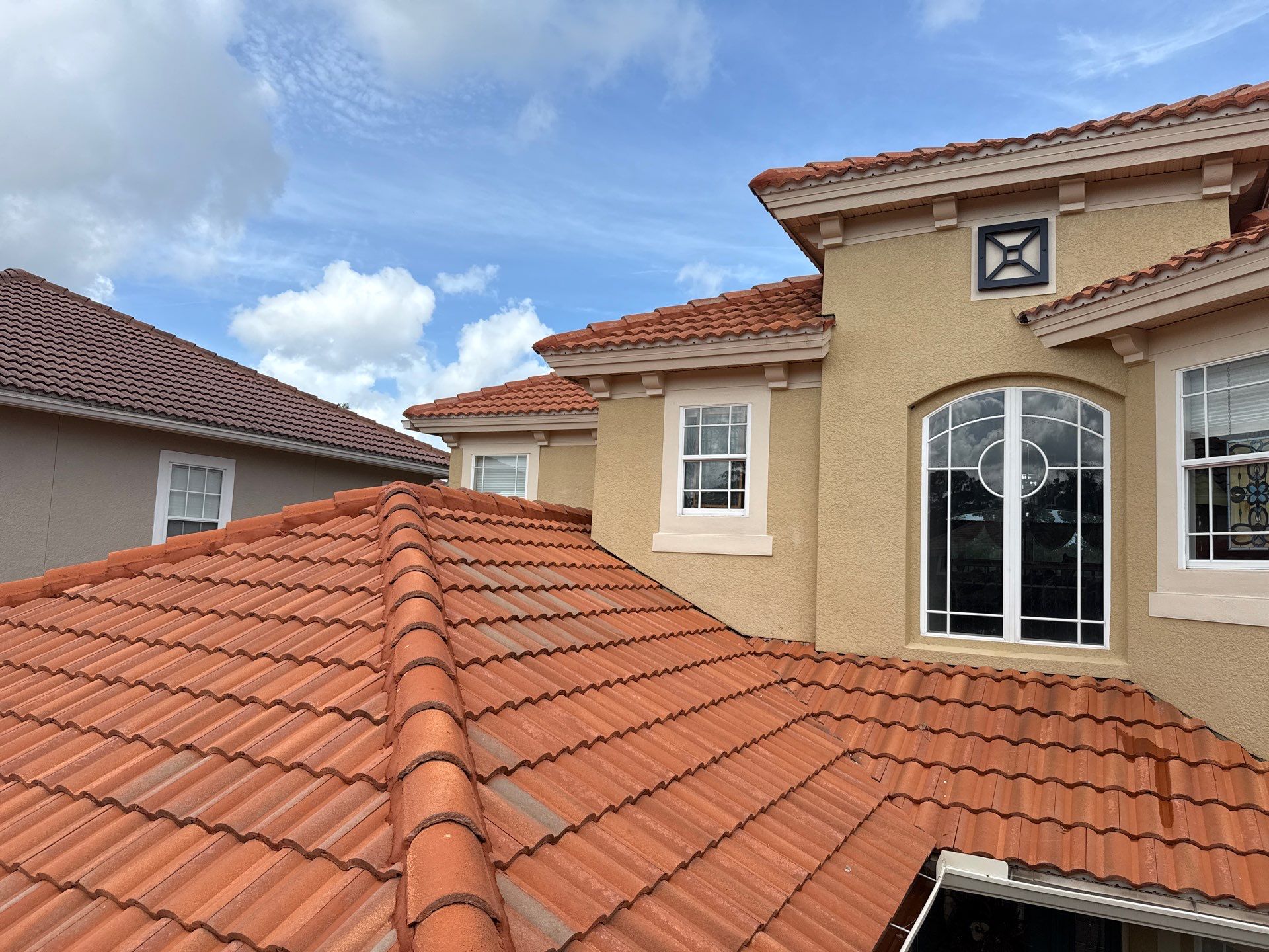 Soft Wash Tile Roof Cleaning in Sonoma Community, Sarasota, FL by Sunshine AquaWash