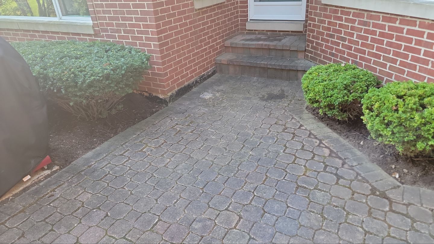 Brick paver repair, clean and seal by Northern Power Washing LLC.