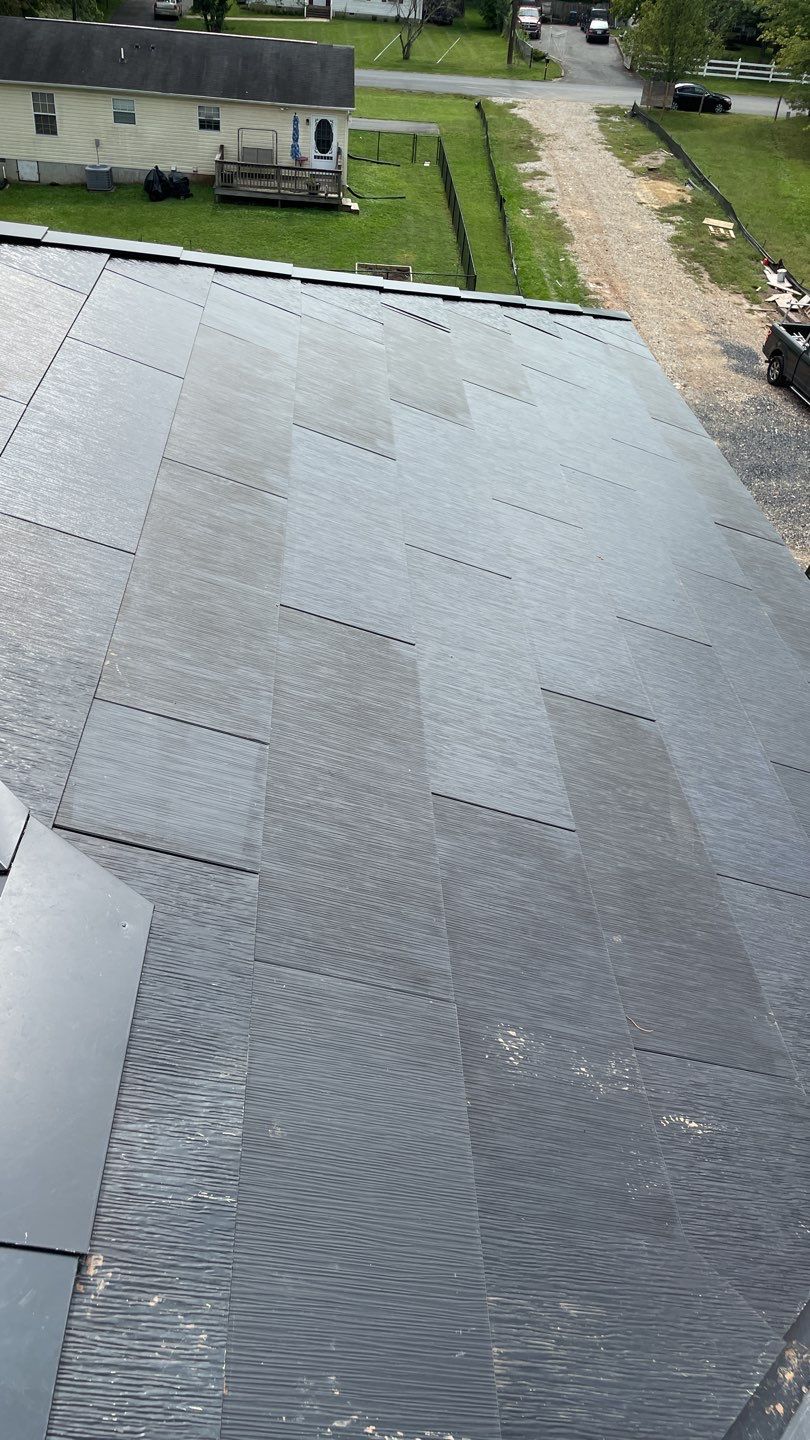 Tesla Solar Roof  using Tesla Solar Roof V3 tiles by American Home Contractors