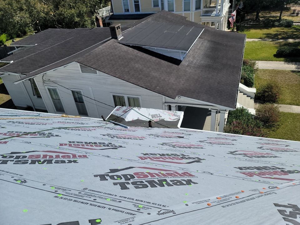 Residential Roofing Installation using Roof Replacement by American Roofing & Construction LLC
