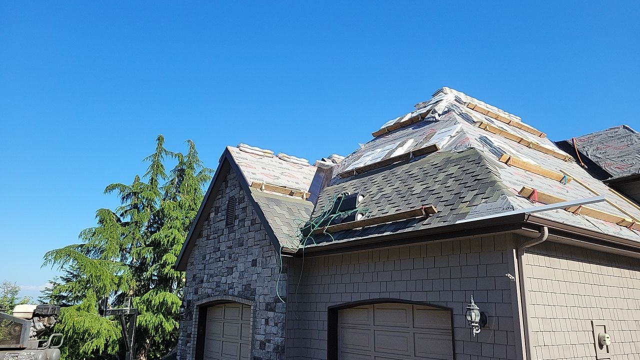 Residential Roofing Installation using Malarkey Windsor 50 Year Shingle (Color: Storm Grey) by Orezona Building & Roofing Company, Inc.