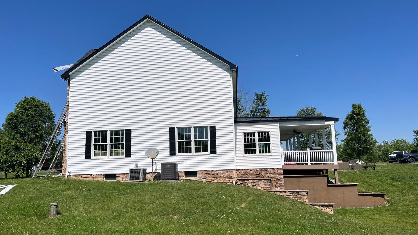 Roof Damage using Certainteed Lifetime Roofing System- Moire Black Landmark Pro shingkes with shadow ridge caps. by BulletpROOF Exteriors
