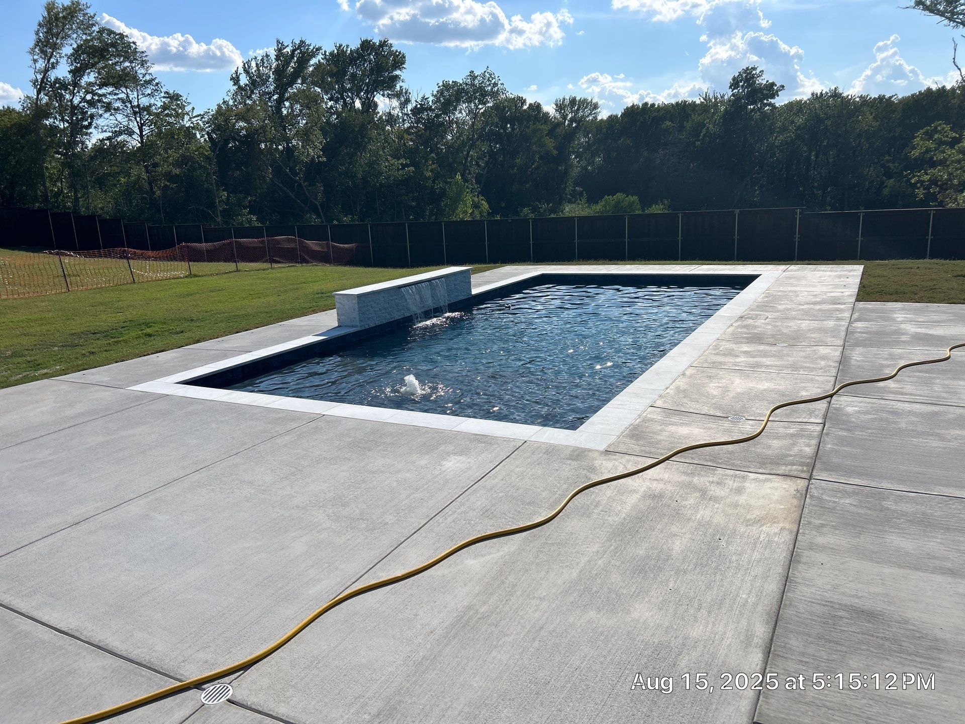 Modern Geometric Pool with Raised Wall Feature by Pinnacle Pools and Spas - DFW