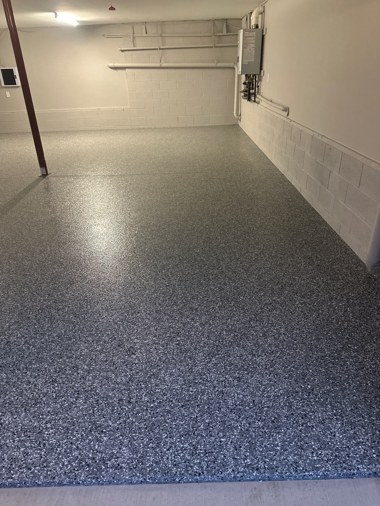 Garage Floor Coating using Wombat by My Garage Floor Guys