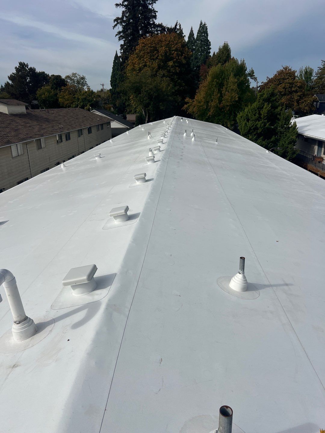 Commercial Flat Roof Installation using GAF 60Mil TPO  by Orezona Building & Roofing Company, Inc.