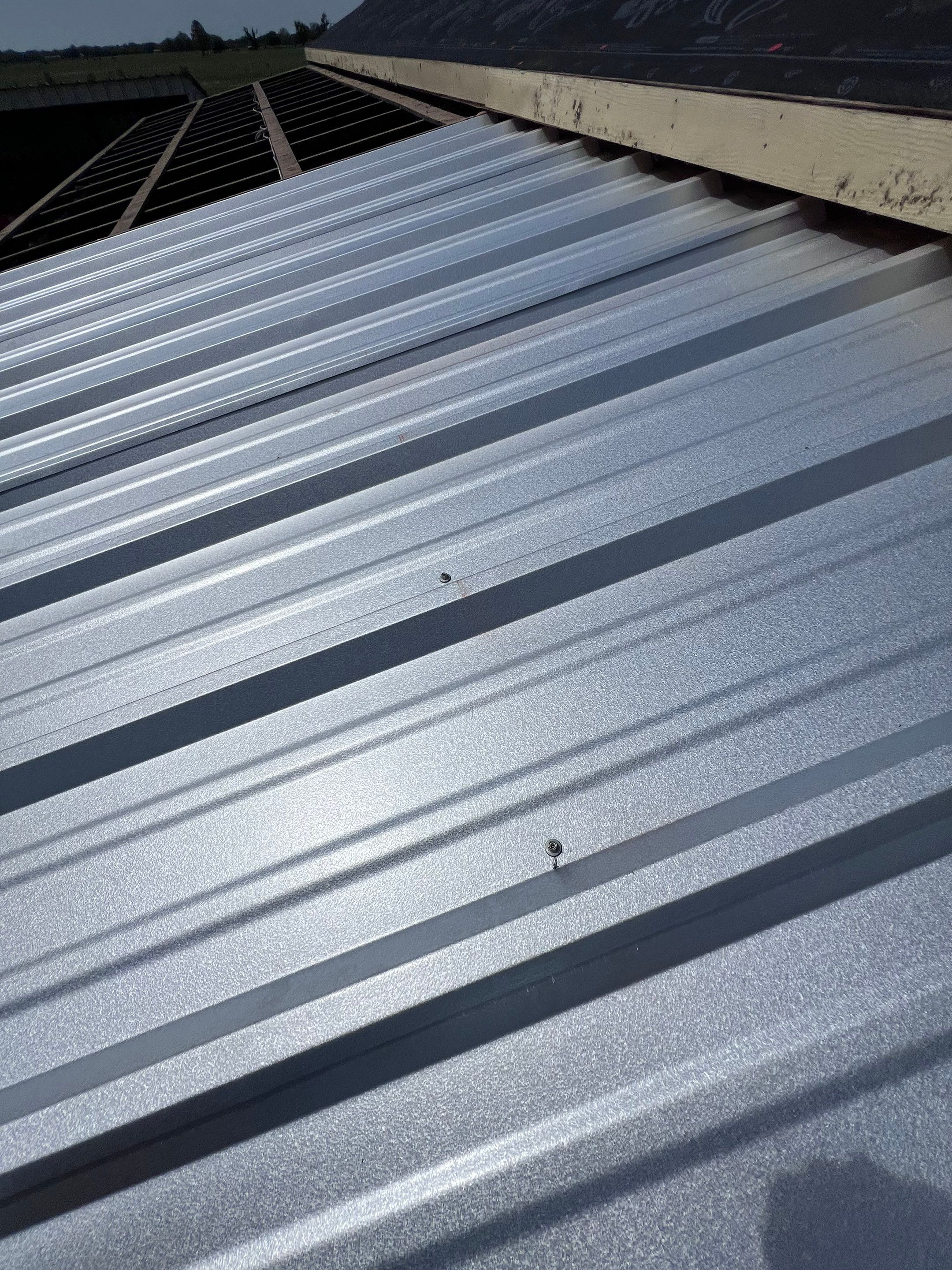 Residential Roofing Installation using Metal by Roof Repair Company