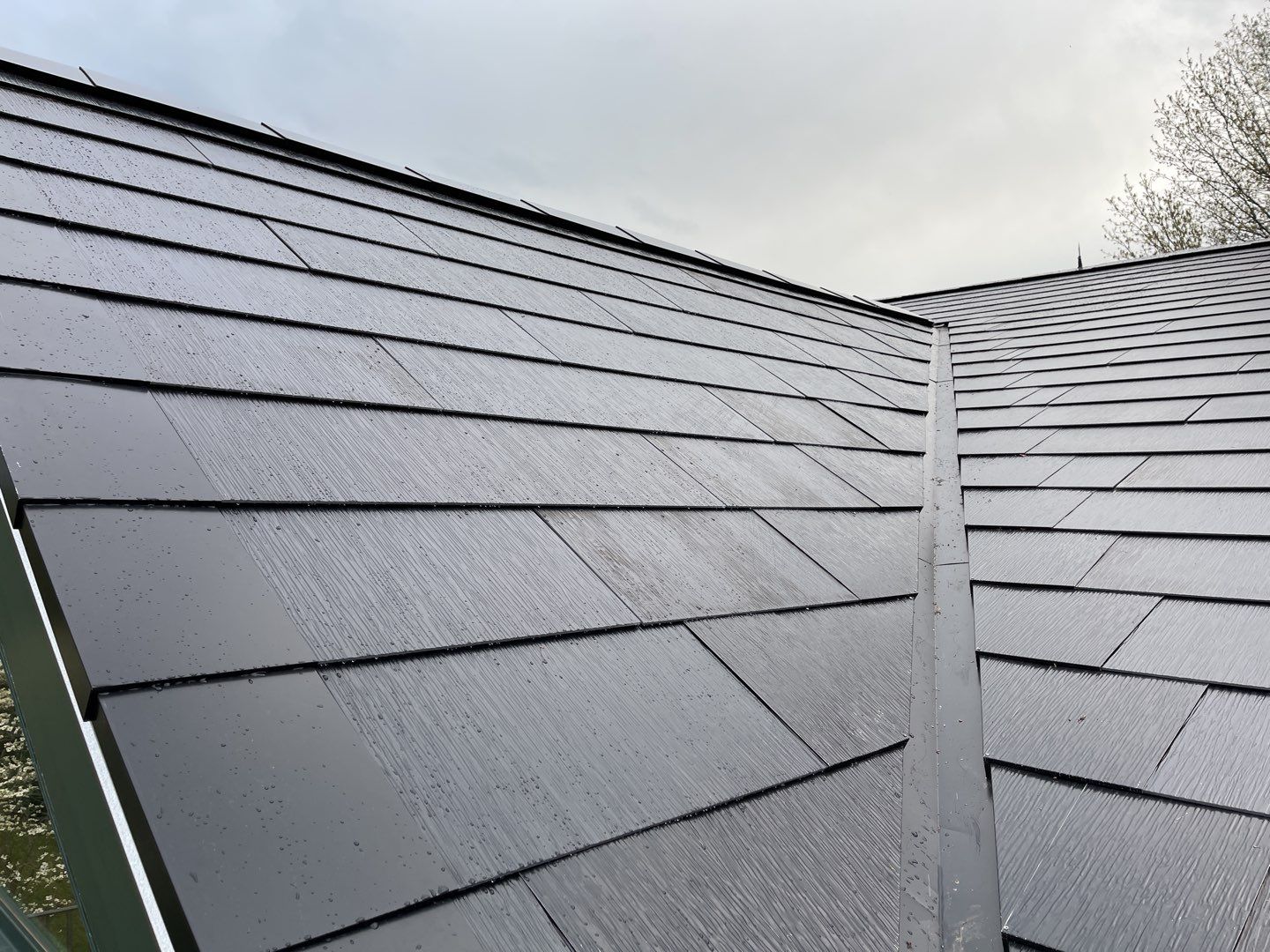 Tesla Solar Roof Replacement by American Home Contractors