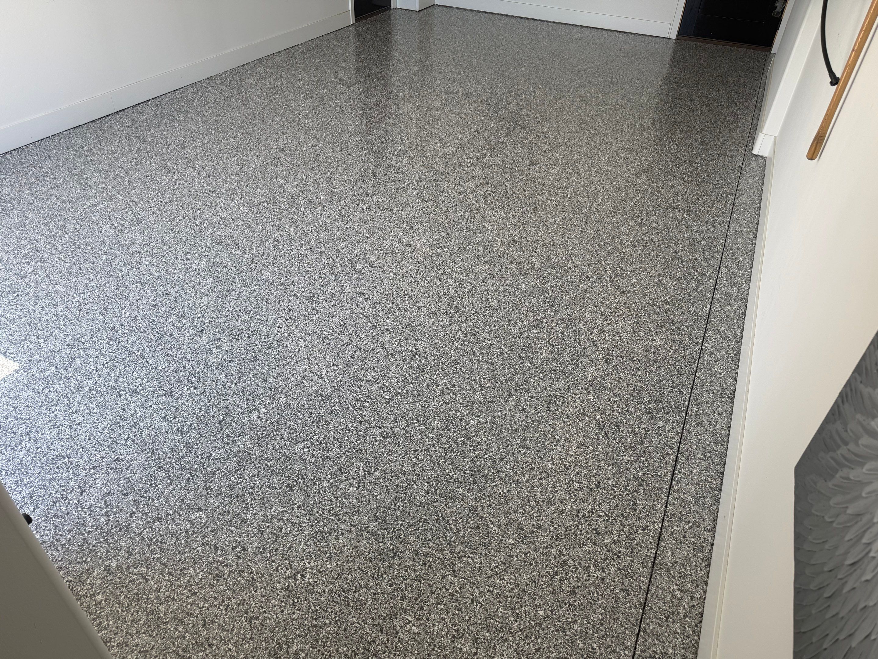 Gravel Flake Garage Floor Coating in Yankton by Select Painting, Coatings & Garage Cabinets