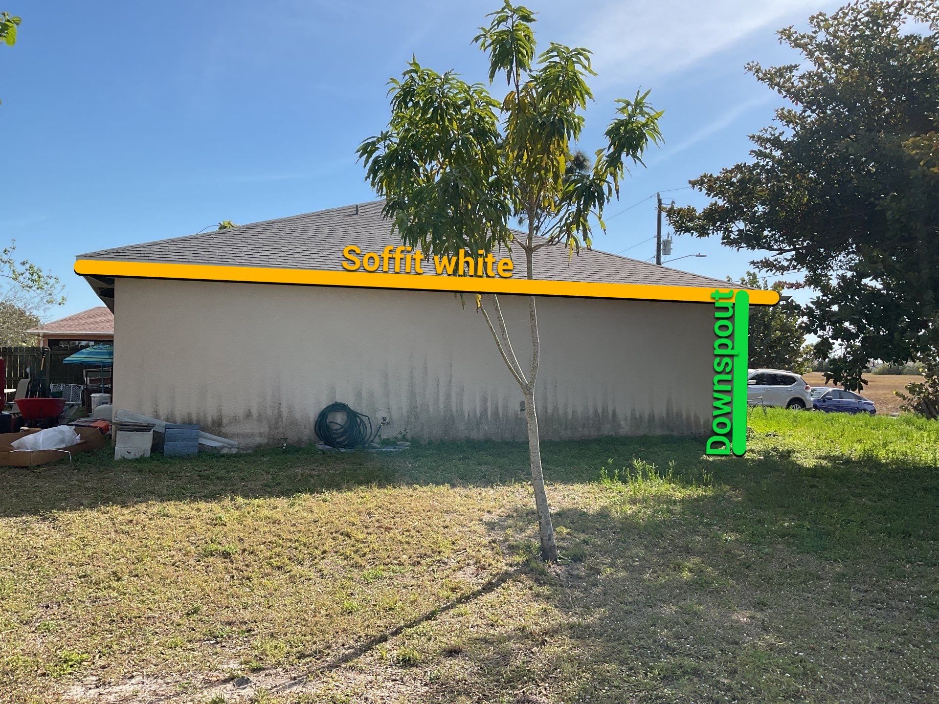 White Seamless Gutters and Soffit Installation in Cape Coral FL by Gutter Professors