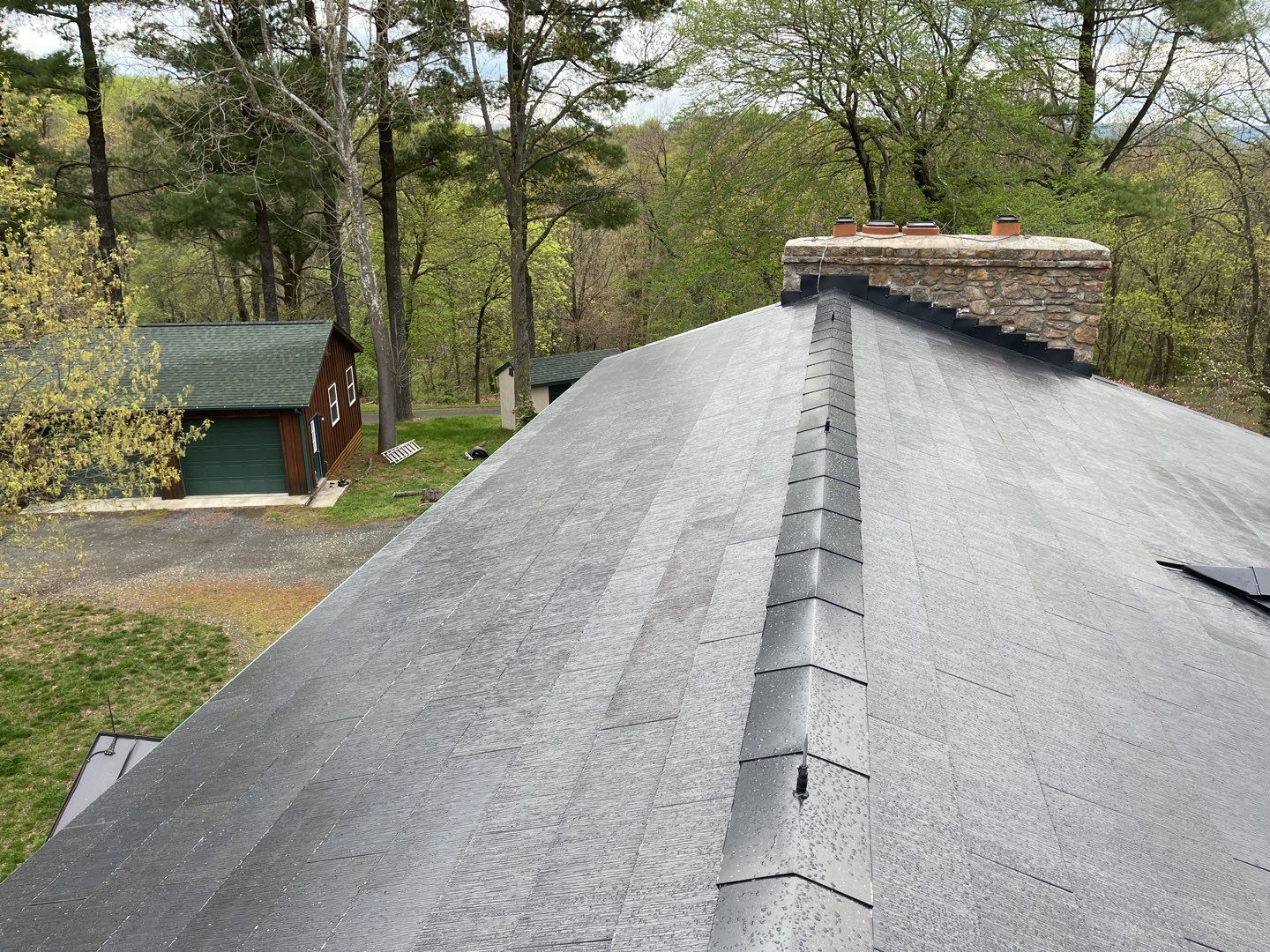 Tesla Solar Roof Replacement by American Home Contractors