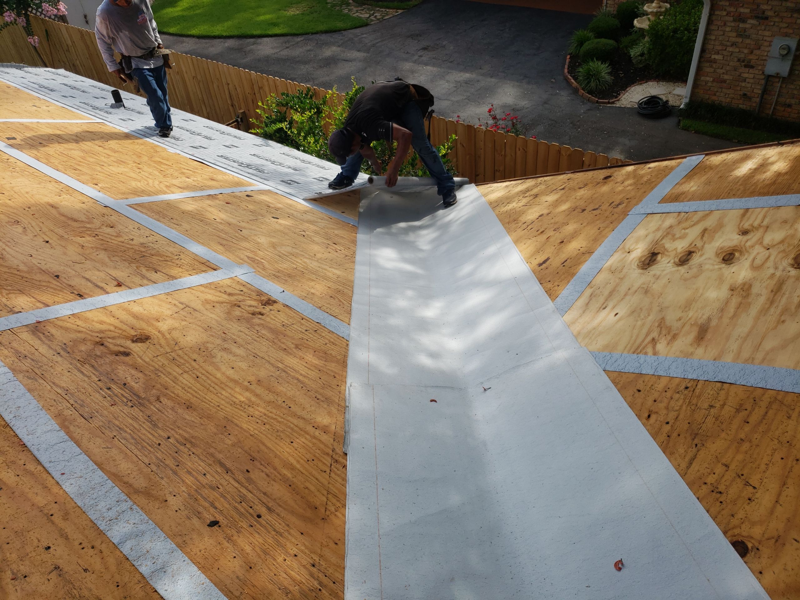 Residential Roofing Installation using Roof Replacement by American Roofing & Construction LLC
