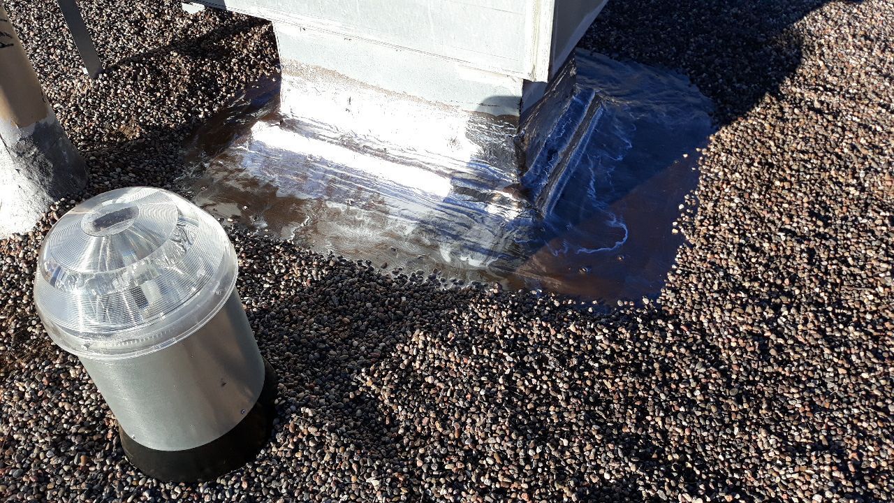 Tar and Gravel Roof Maintenance and Penetration Sealing in Albuquerque by Doyle Roof Masters Inc