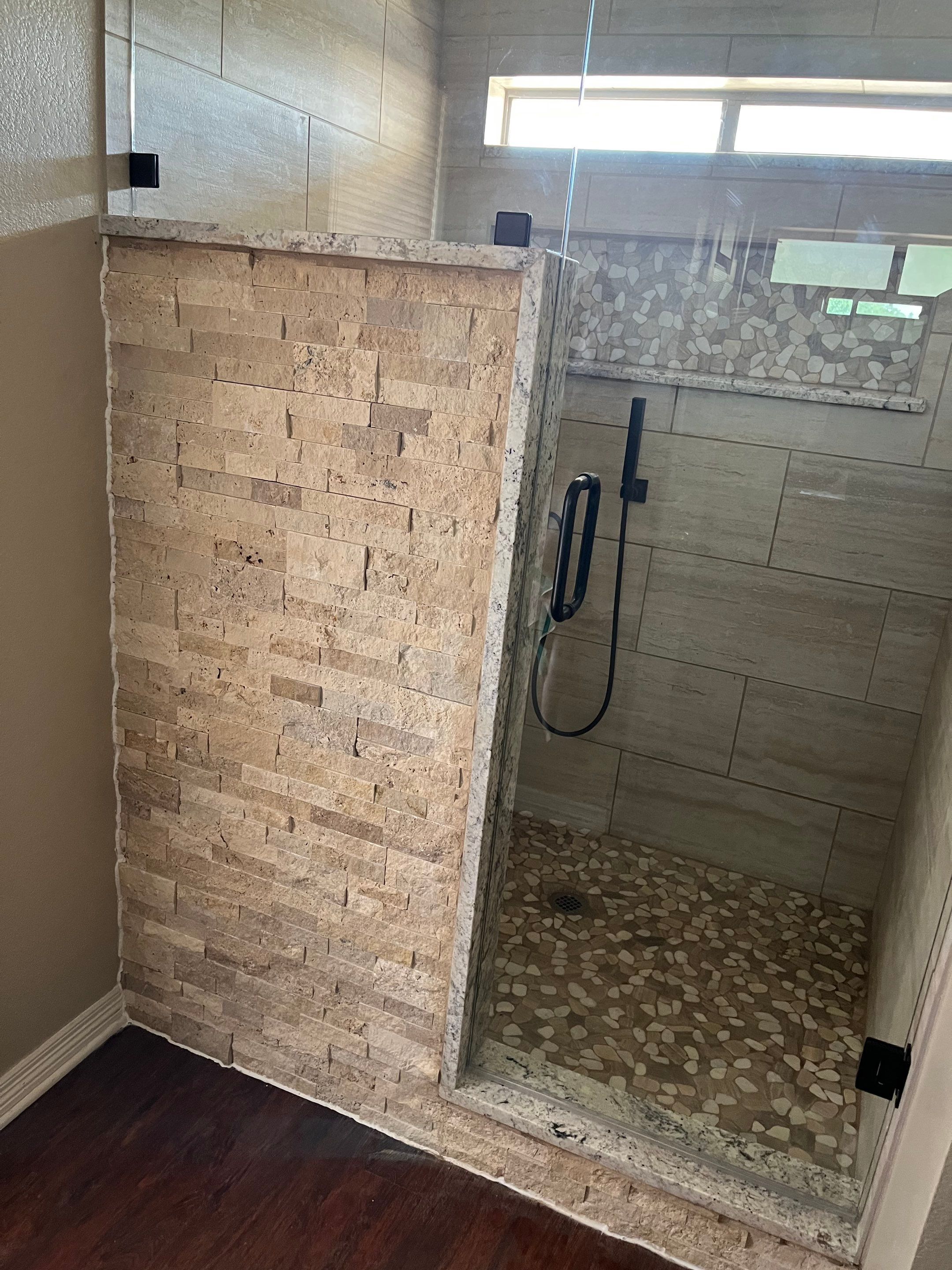 Bathroom Shower Remodel for a client by First United Roofing & Construction