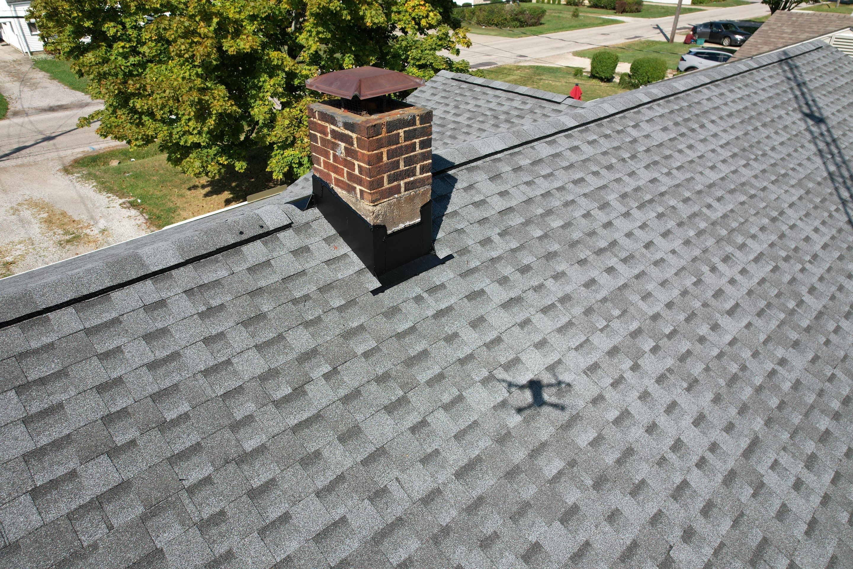 East Lake Roof & Garage  Replacement (With Gutters) by Atlas Roofing & Restoration