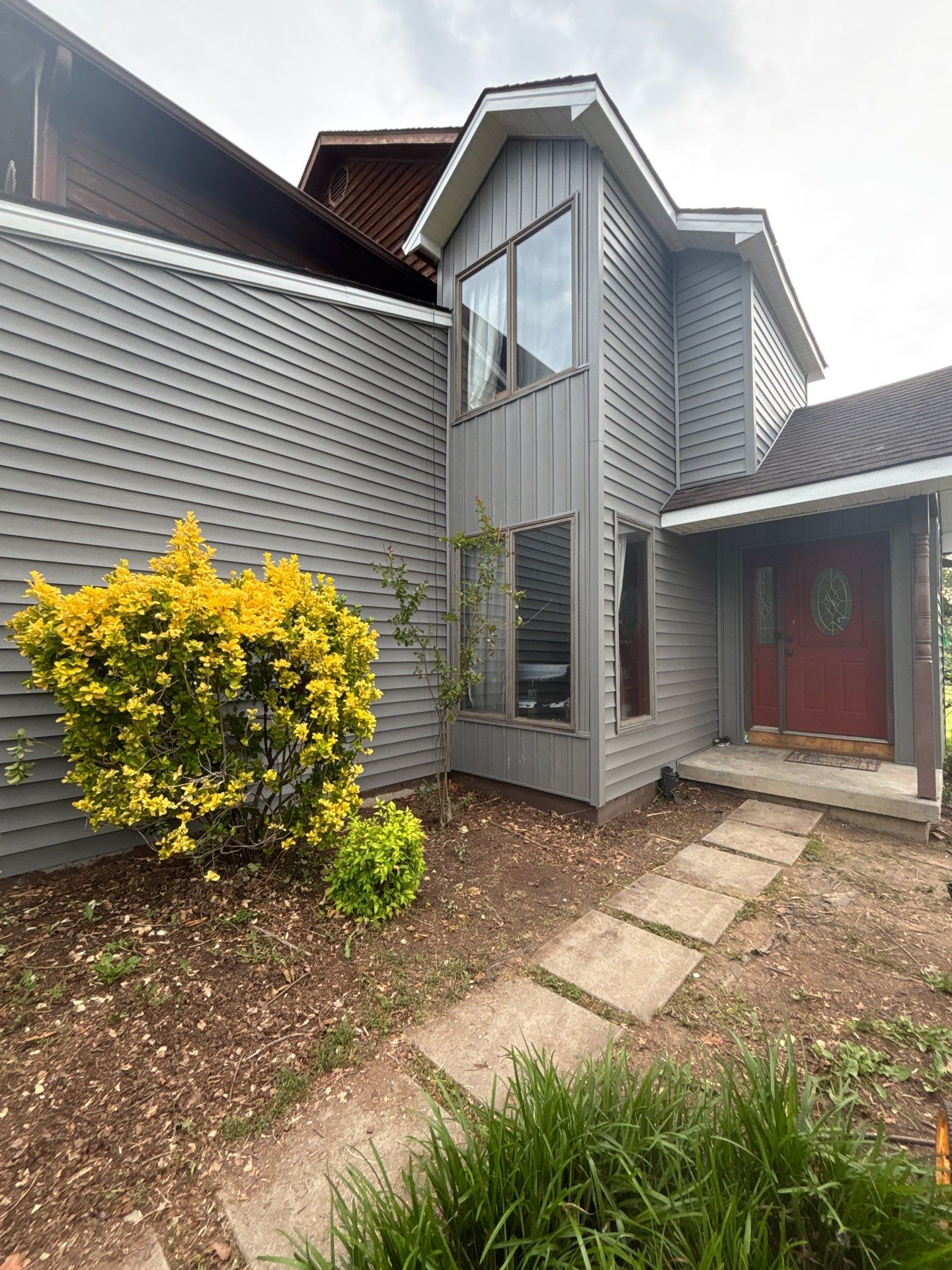 Siding and Gutter Replacement by Winchester Roofing