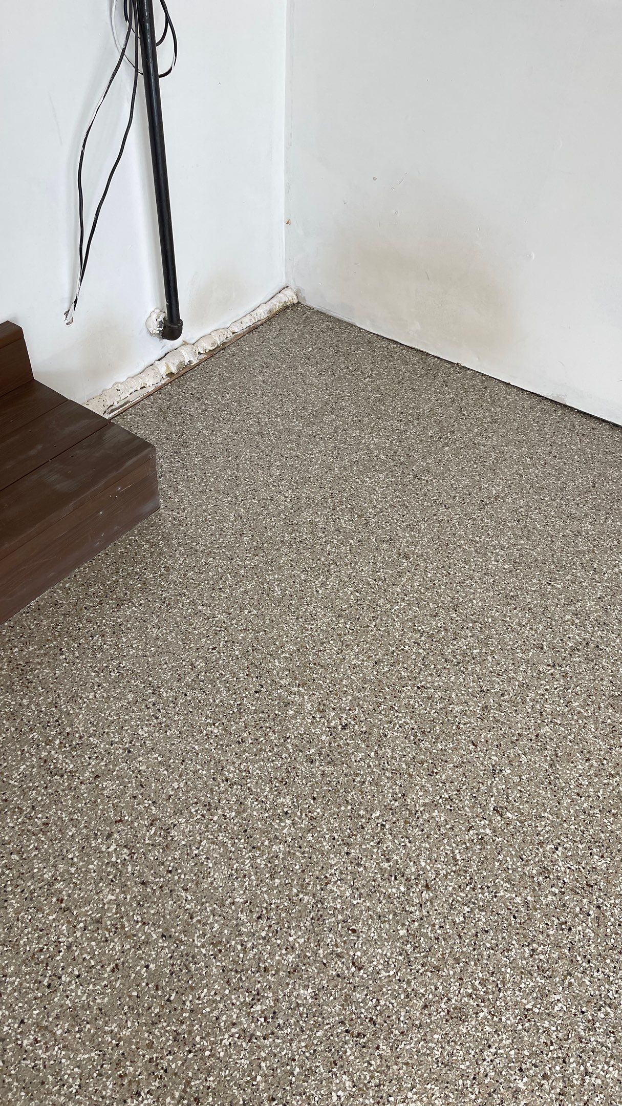 Garage Floor Polyaspartic Coating with Pebble Beach 1/4" Flakes by Croc Coatings, LLC