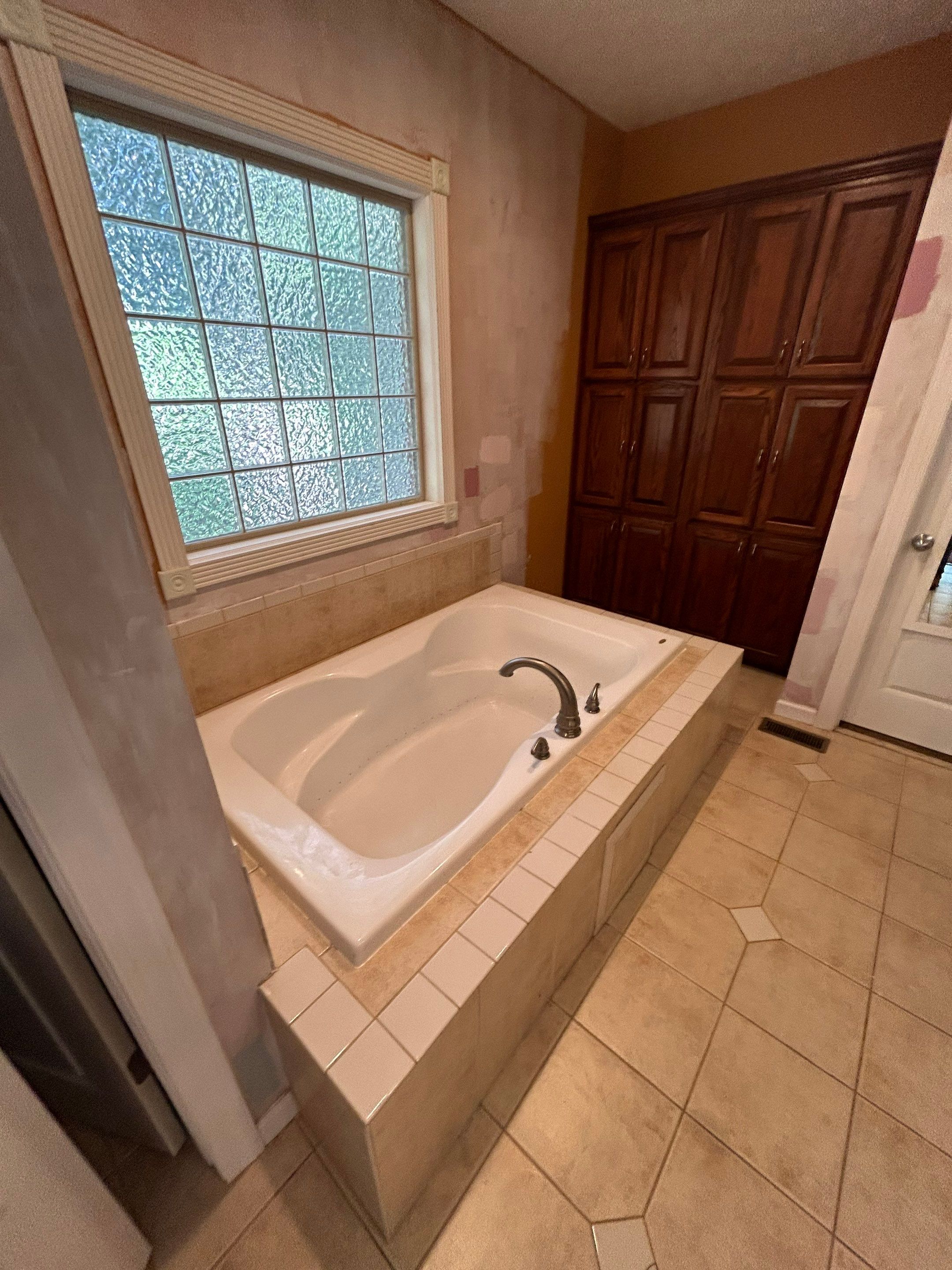 Tub to shower conversion  by Footprints Floors of Nashville