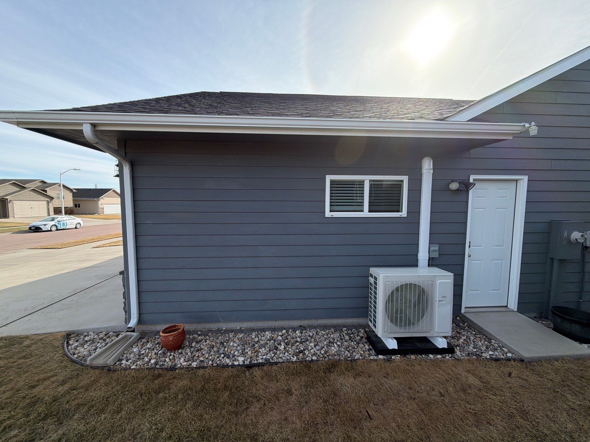 Residential Exterior Painting and Siding Refresh in Sioux Falls by Select Painting, Coatings & Garage Cabinets