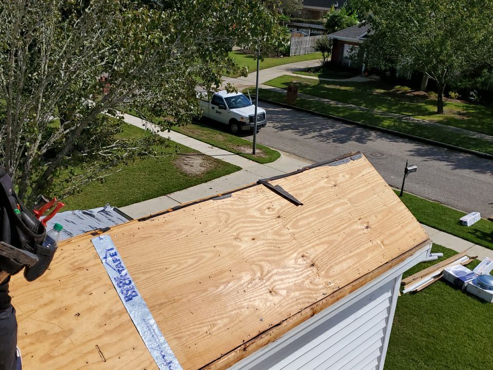 Residential Roofing Installation using Roof Replacement by American Roofing & Construction LLC