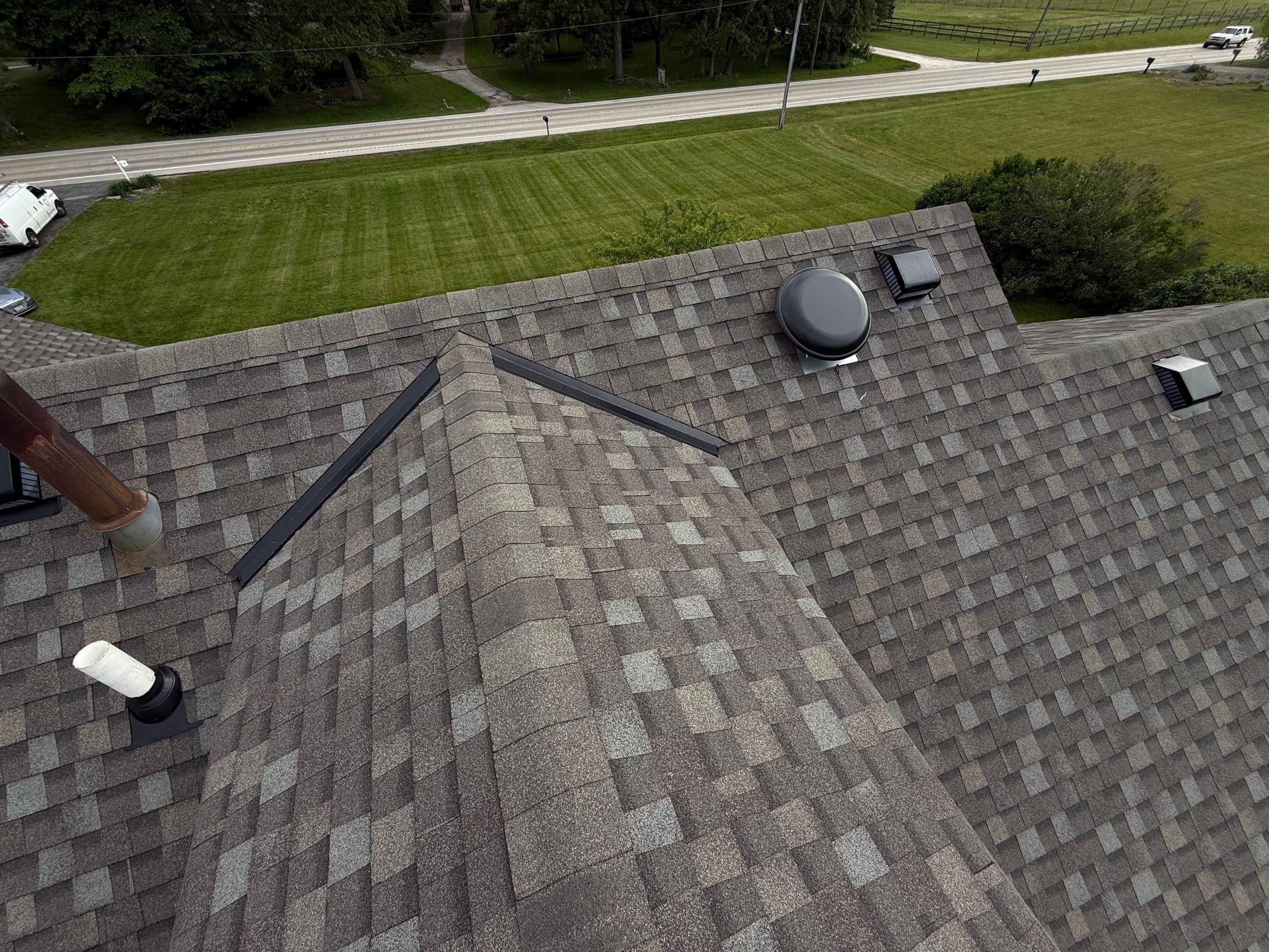 Roofing, copper chimney cap and copper awning by Optimal Home Improvement 
