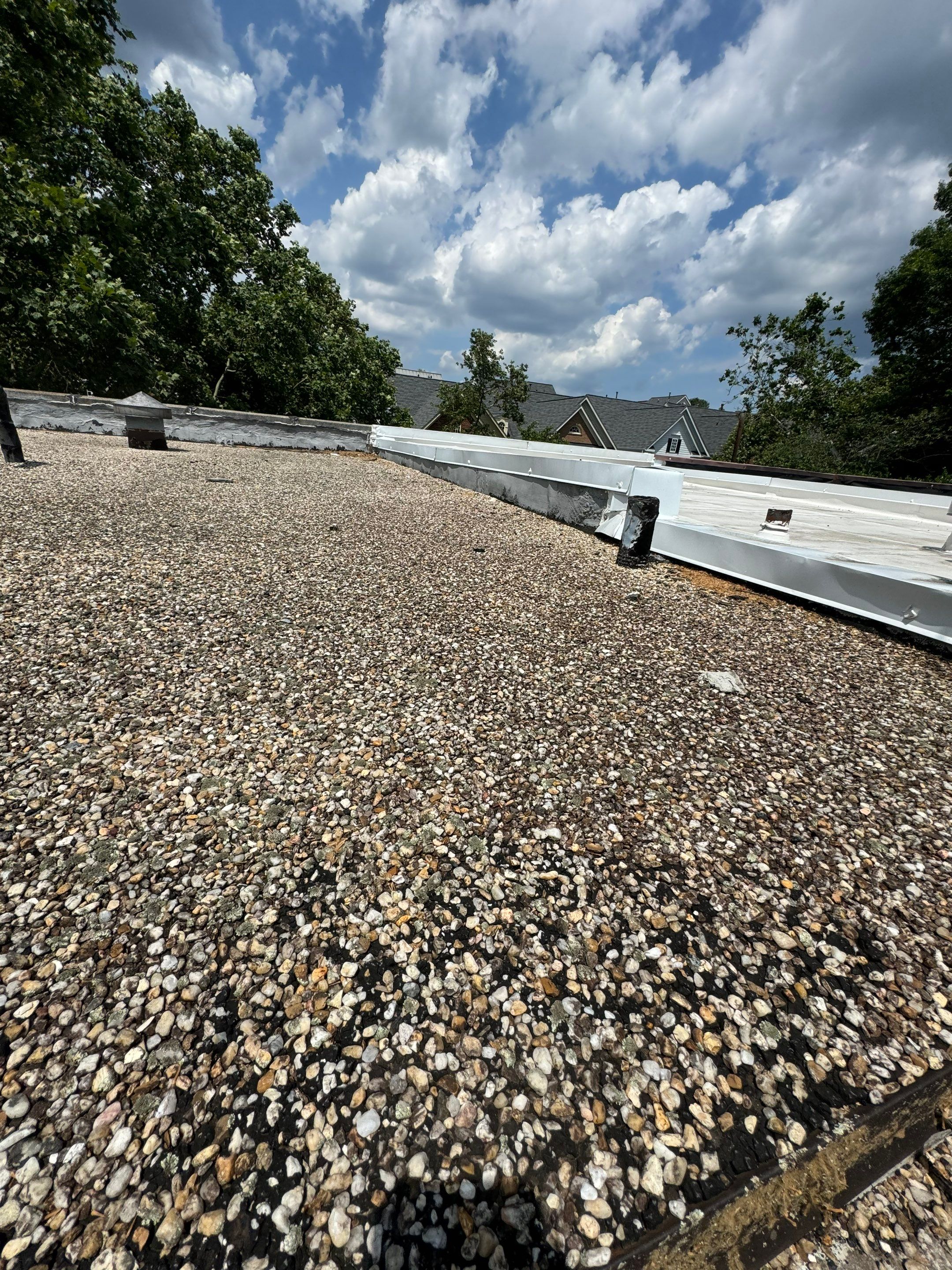 Townhouse Flat Roof Replacement using Carlisle TPO System by USA Storm Roofing and Construction Group