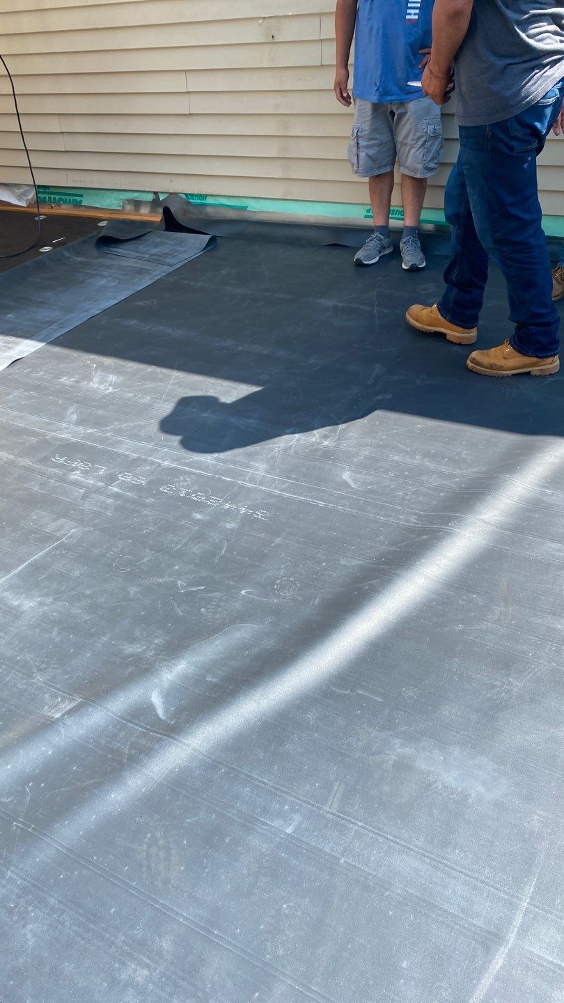 Siding Repair using Certainteed Mainsteet D4 and EPDM roof under deck by A Plus Exterior