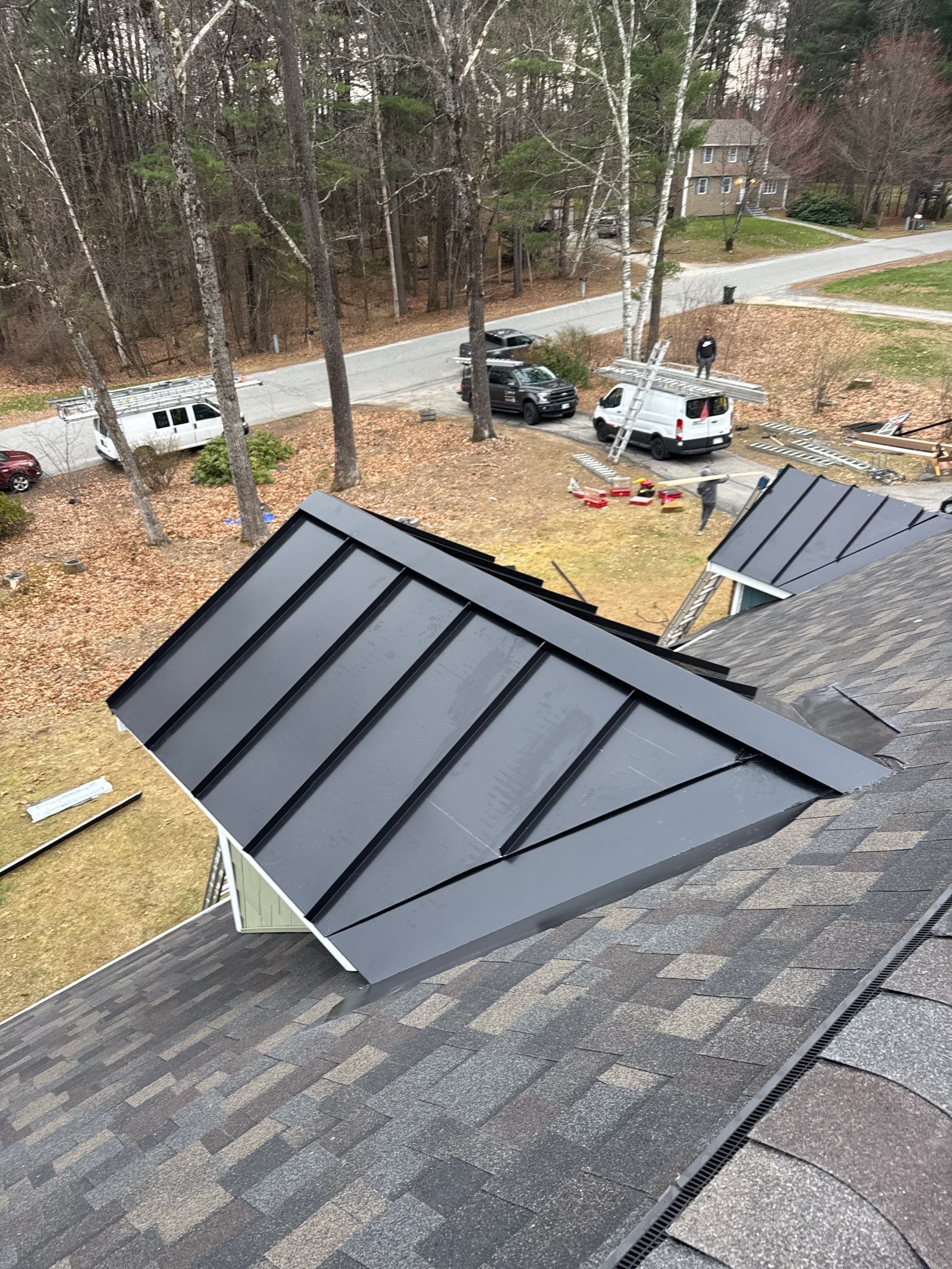 Roof Replacement in Londonderry, NH with Full Re-Decking, Spray Foam Prep & Black Sable Shingles — additional view by Compass Exteriors