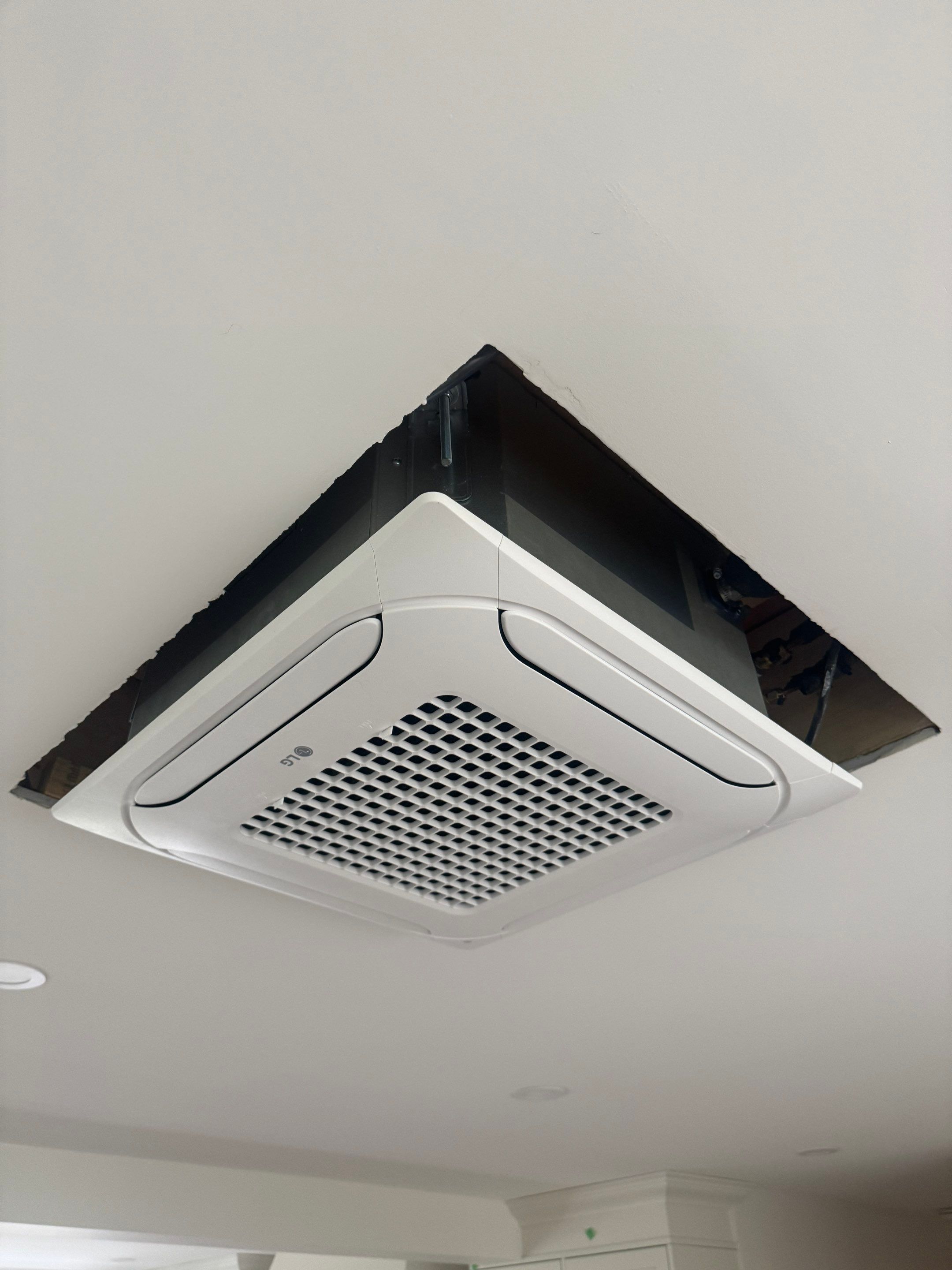 West Vancouver Custom Millwork: Heat Pump Trim & Window Finishing by YVR Construction Group