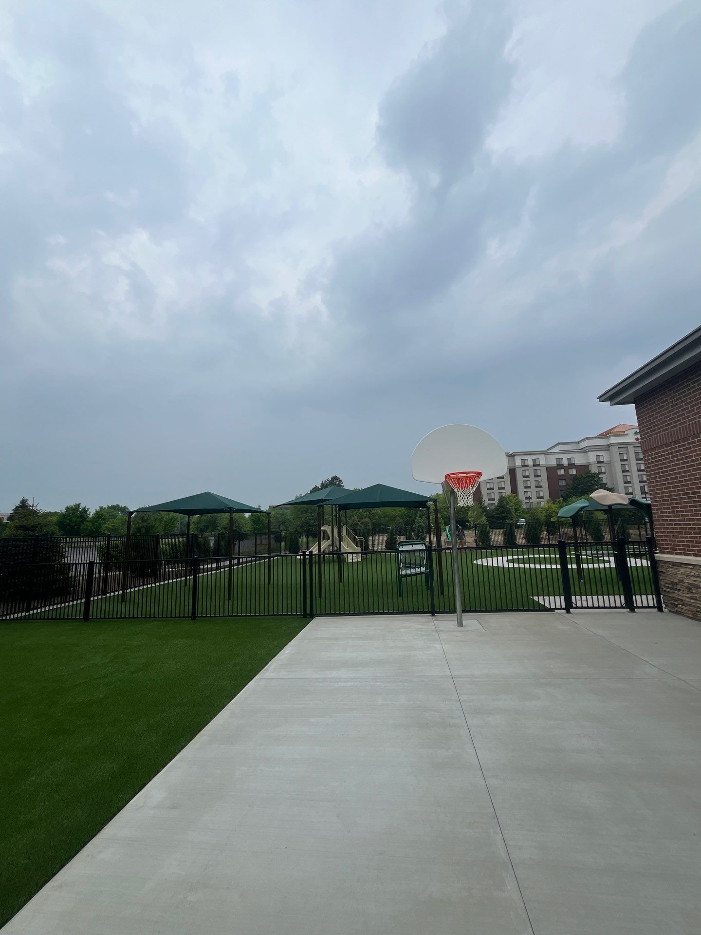 KinderCare of Lincolnshire Commercial Playground Turf Installation by Southwest Greens Midwest