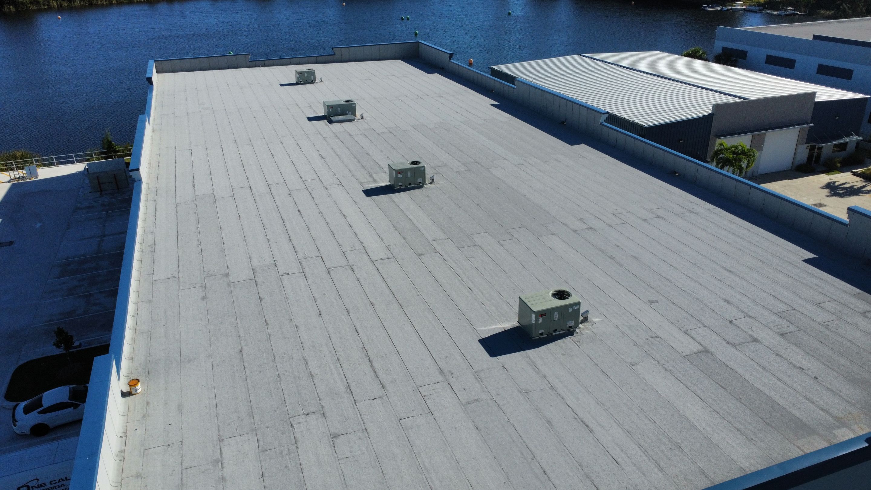 Torch Applied Modified Bitumen Roof Installation by Sailfish Roofing