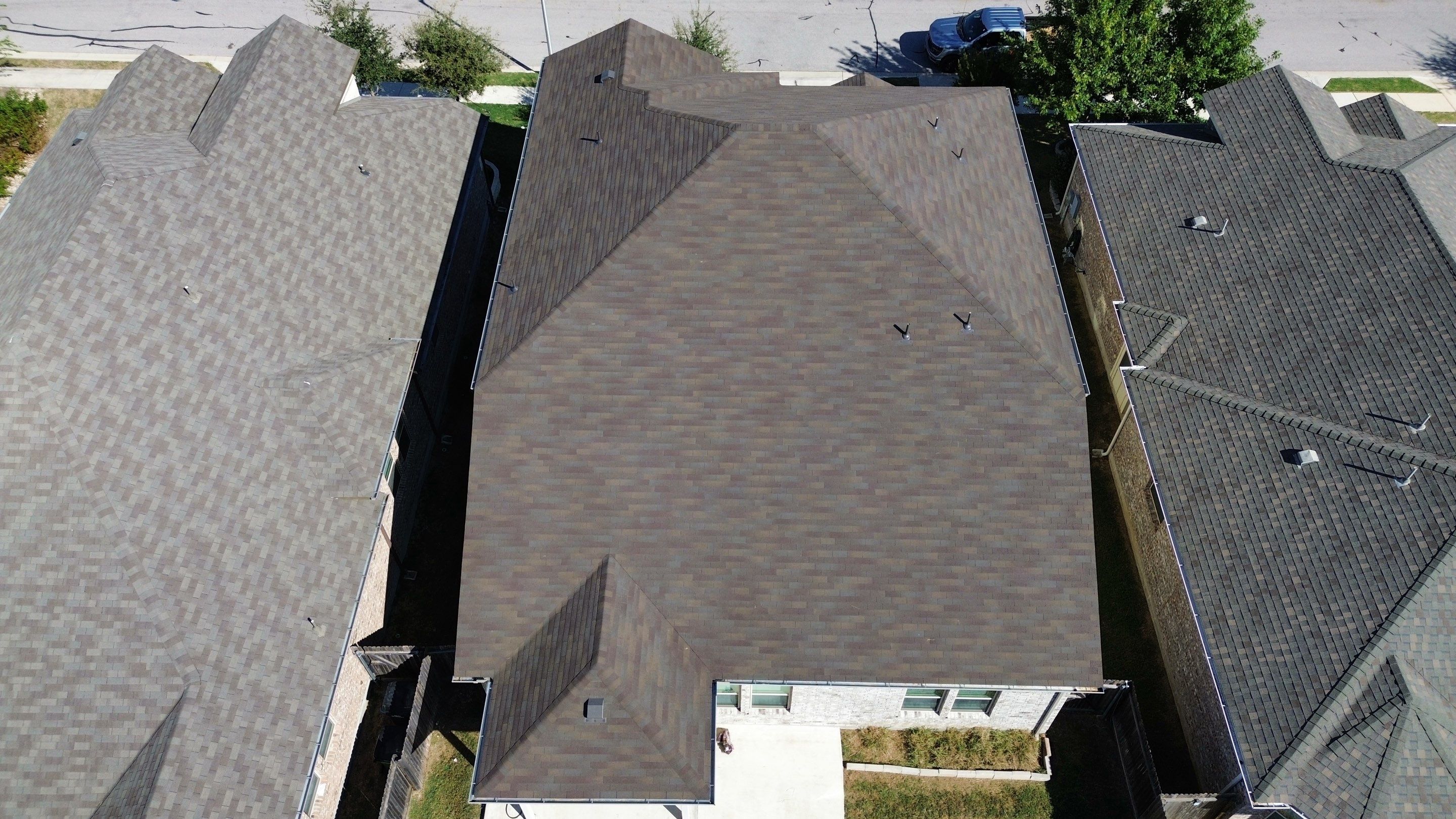 Residential Roof Installation ā Supreme Teak Shingles | Leander, TX by Kstylez Roofing & Construction